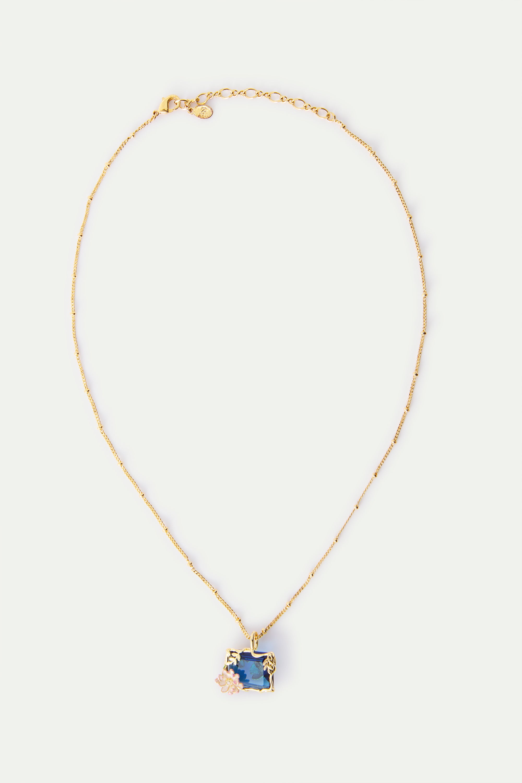 Necklace with blue and pink water lily pendant