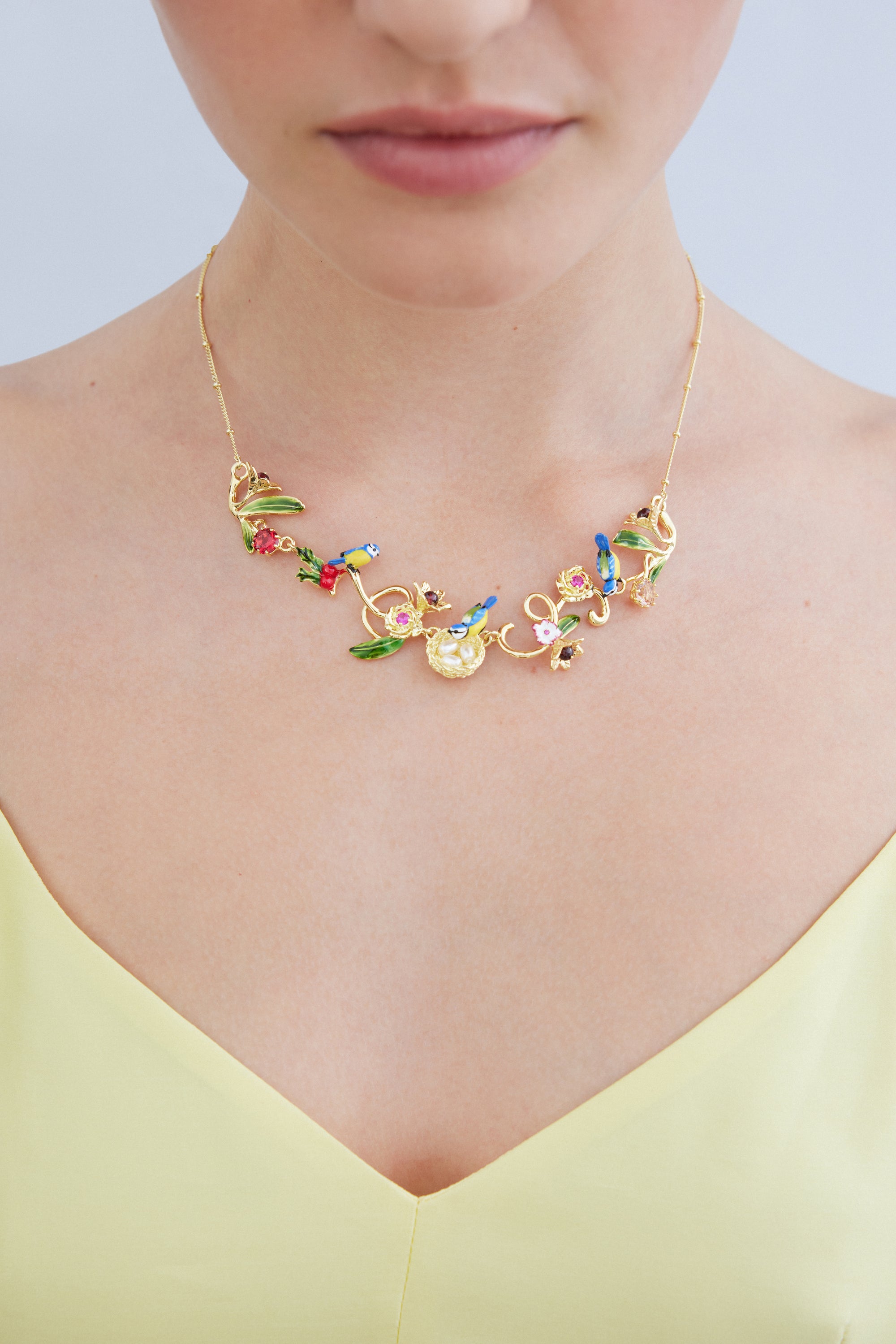 Gold nest necklace with blue tits, pearls and pink stones