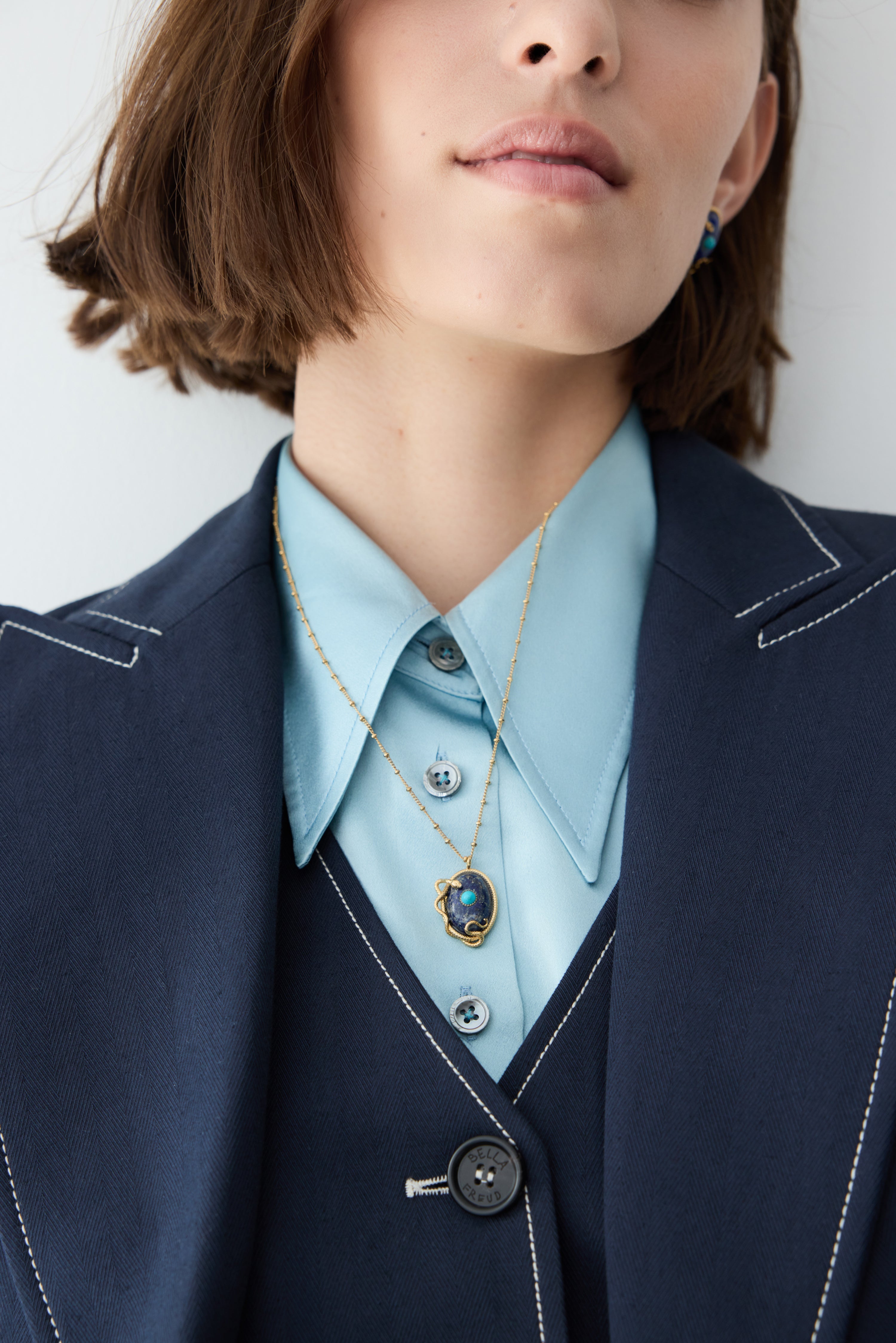 Lapis lazuli, turquoise and gold snake pendant necklace