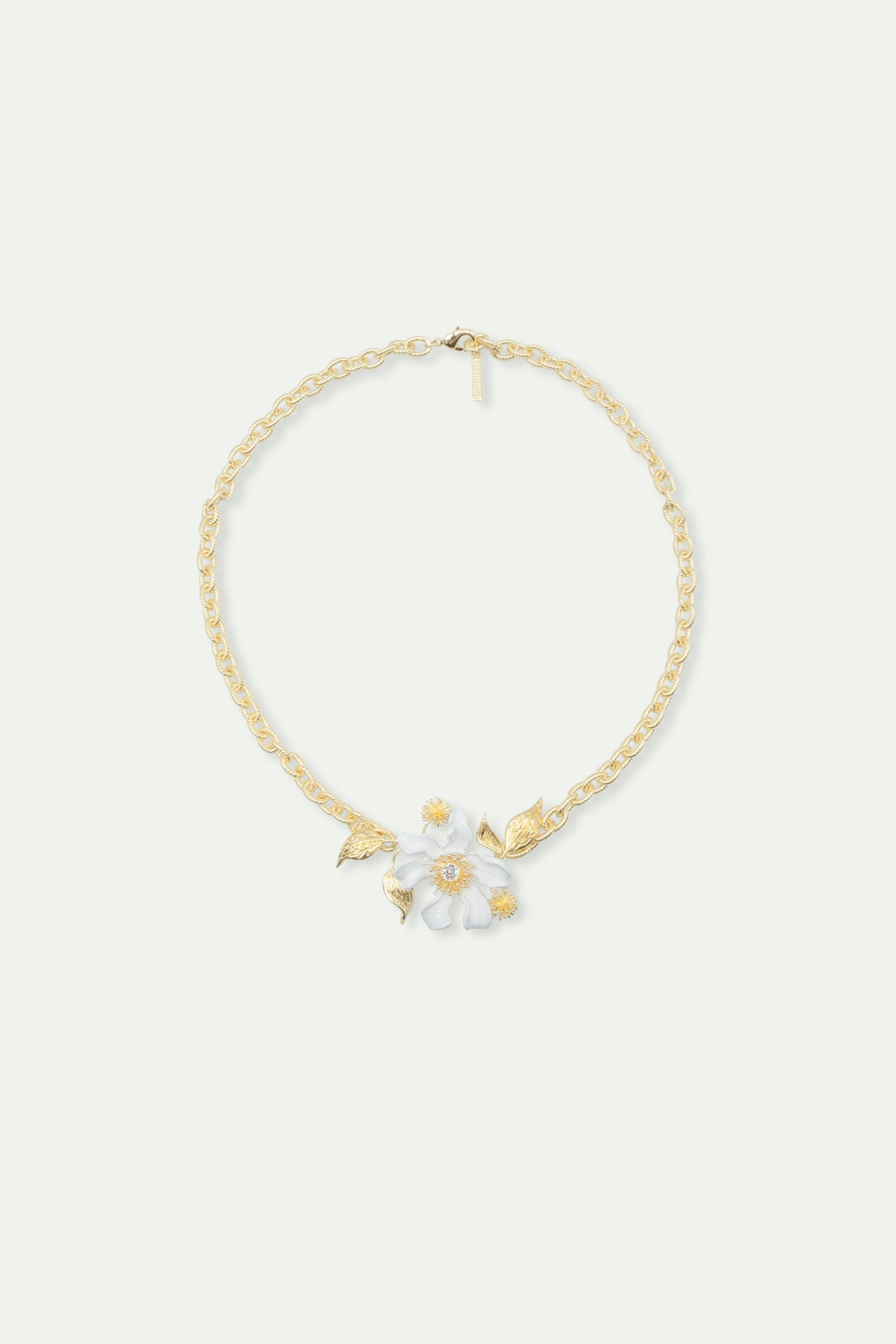 Large white clematis flower, Japanese kerria and laurel necklace
