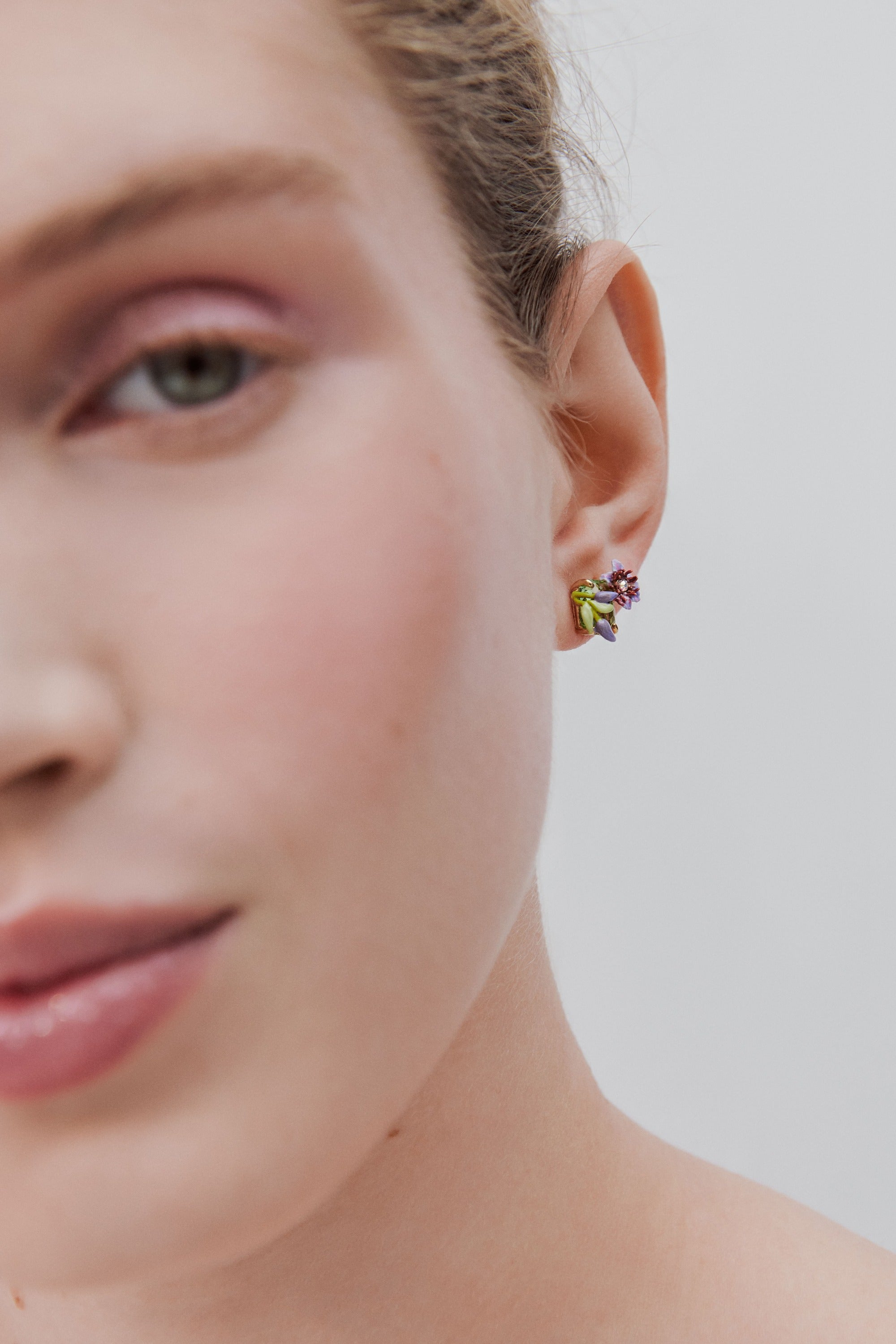 Purple clematis, ivy and emerald-cut faceted green glass post earrings