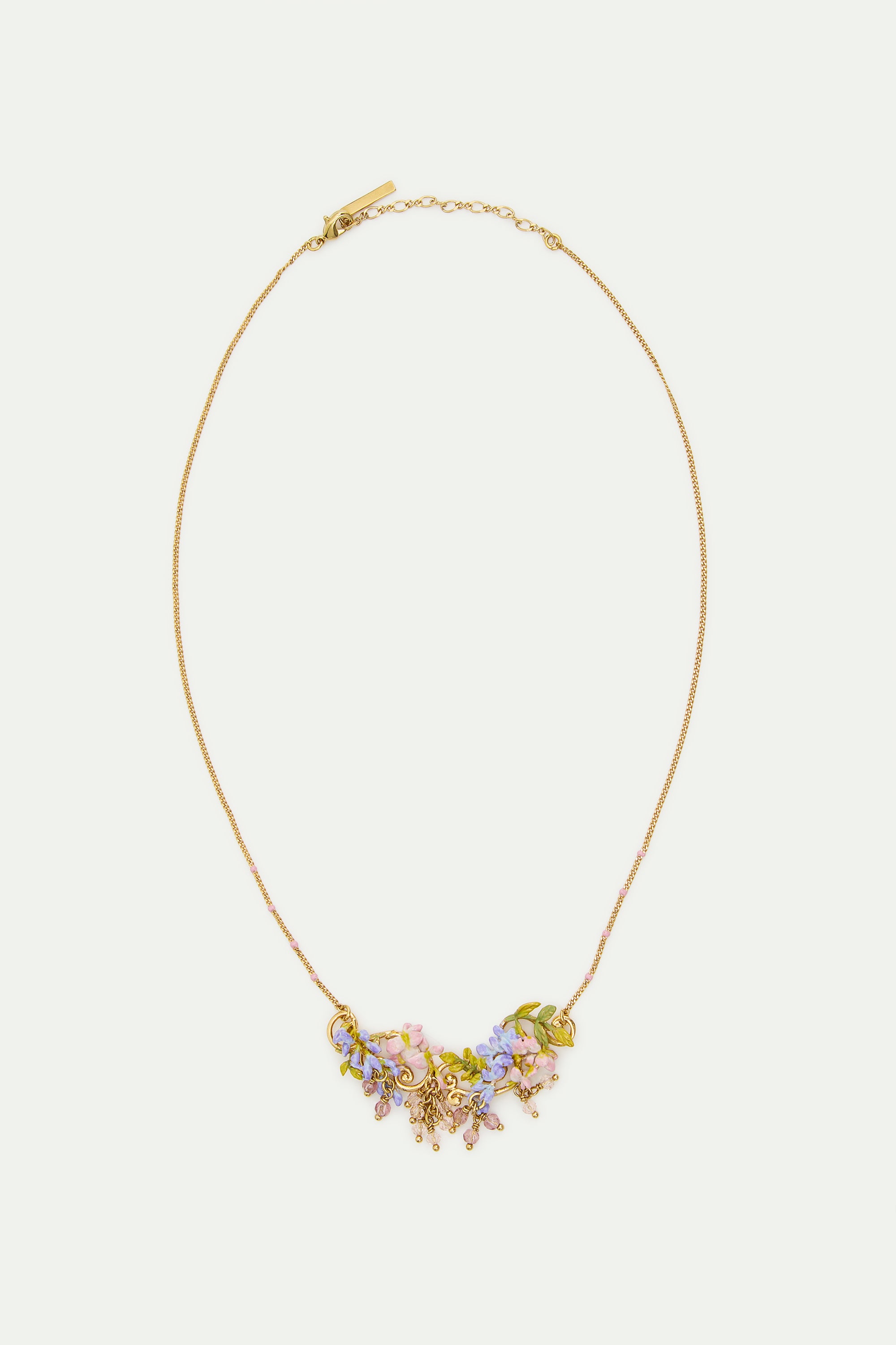 Statement necklace with pink and purple wisteria on a golden arabesque, adorned with ivy and dangling faceted pink and white crystal beads