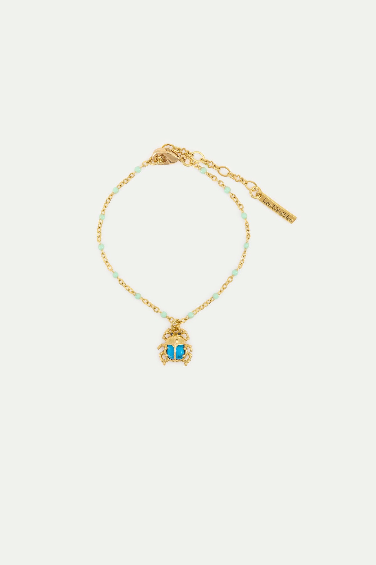 Pulsera fina escarabajo turquesa y dorado