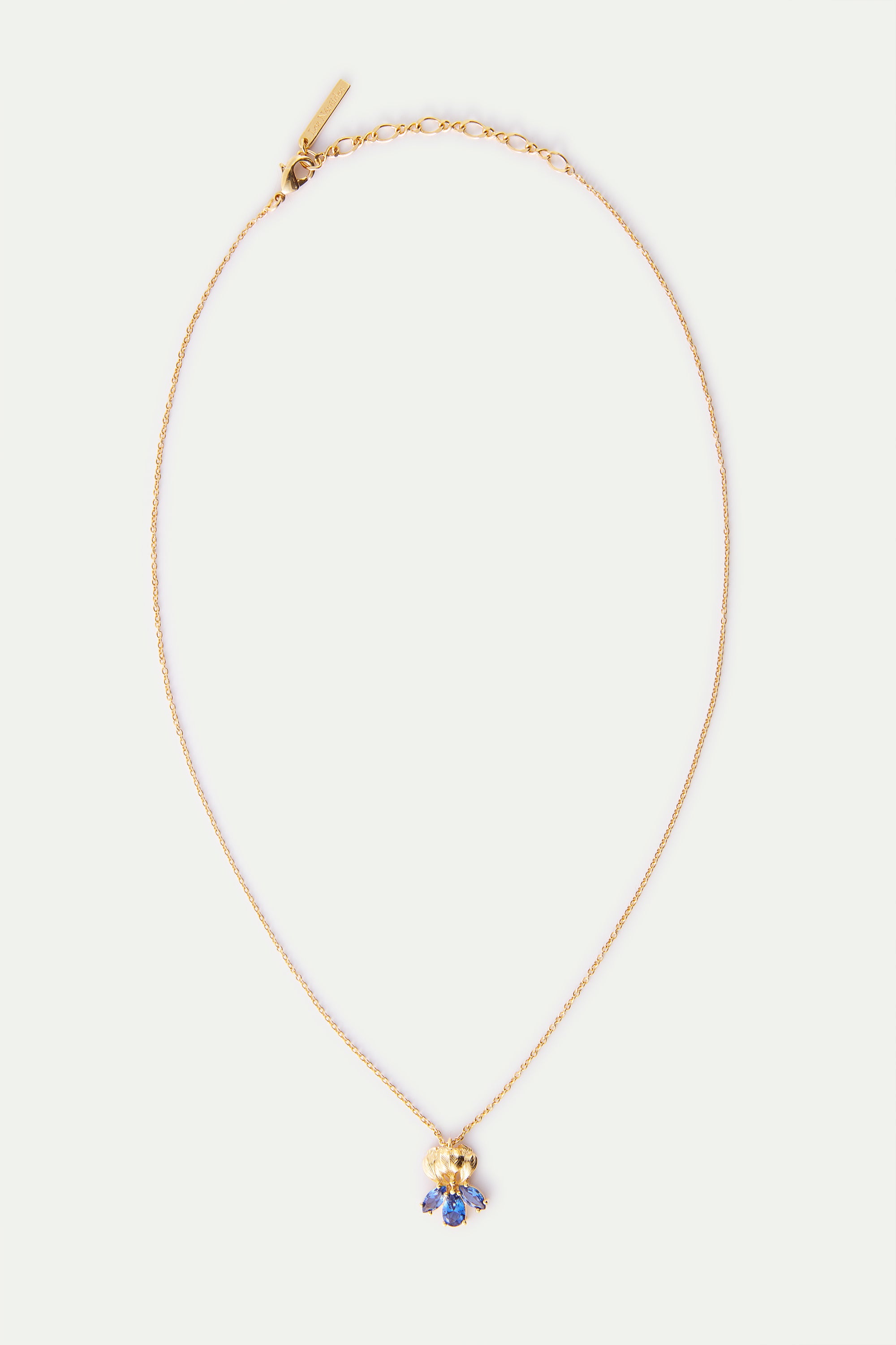Golden iris and blue stone pendant necklace