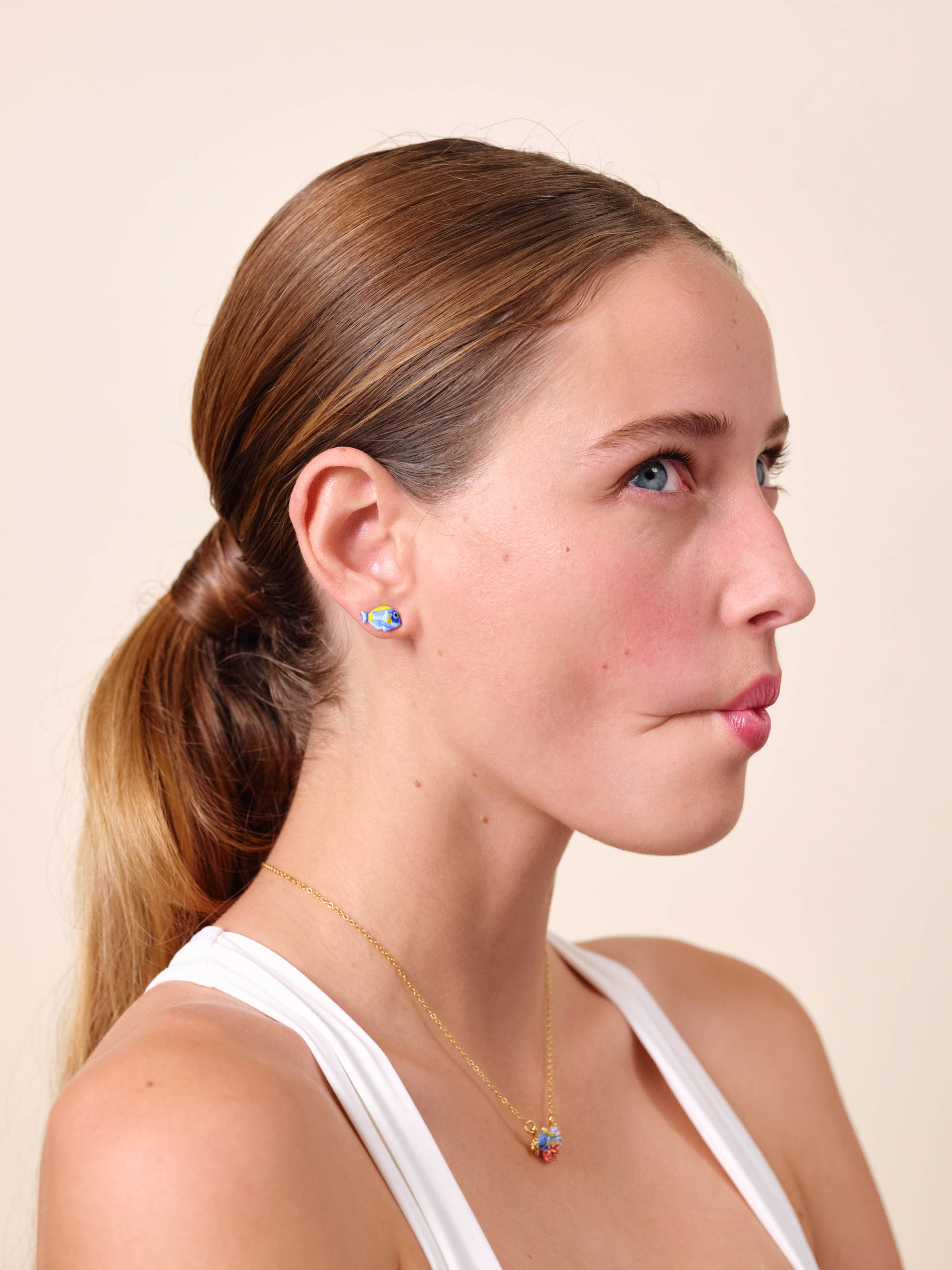 Asymmetrical blue fish and yellow fish post earrings