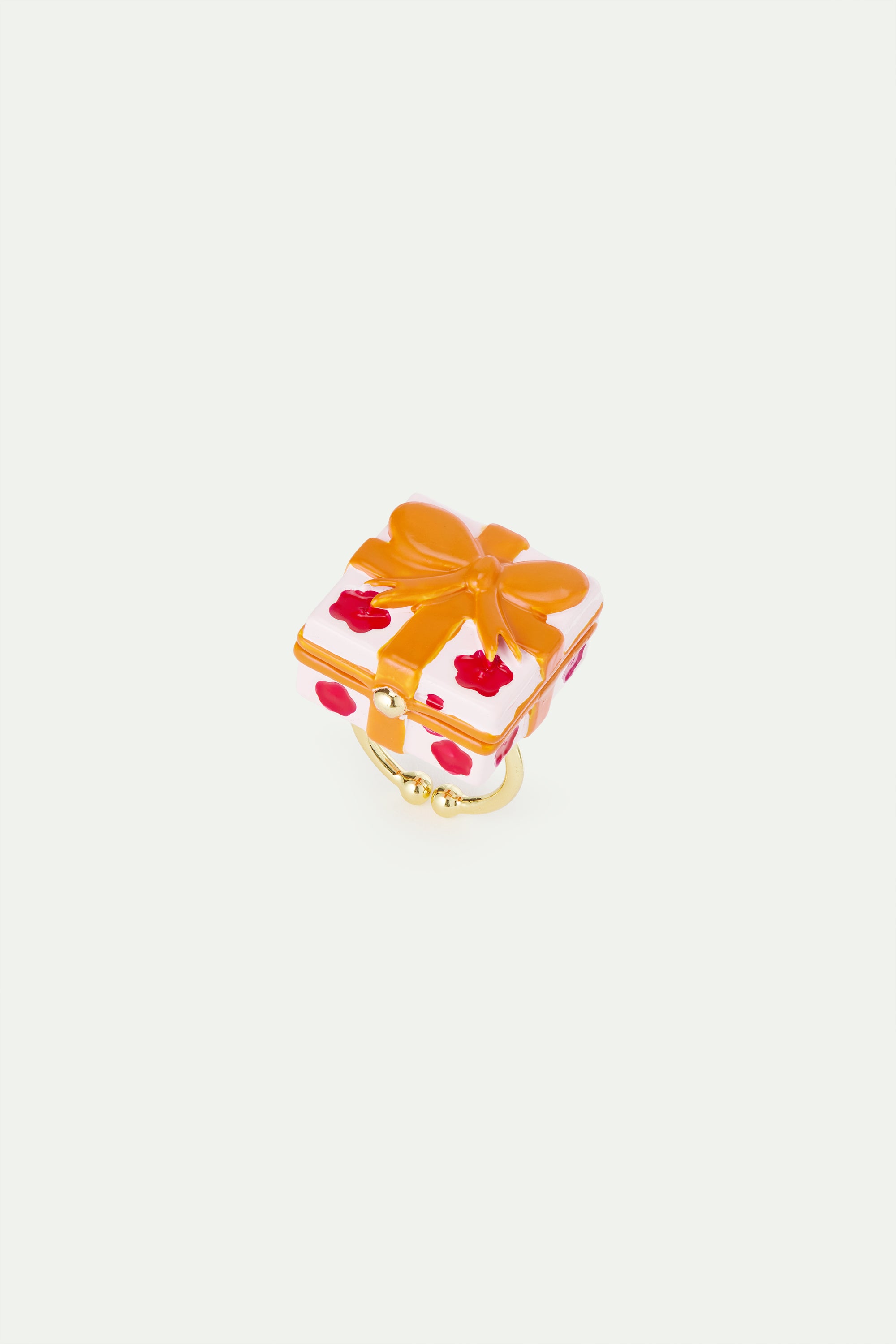 Adjustable ring with pink gift box, red flower and orange bow