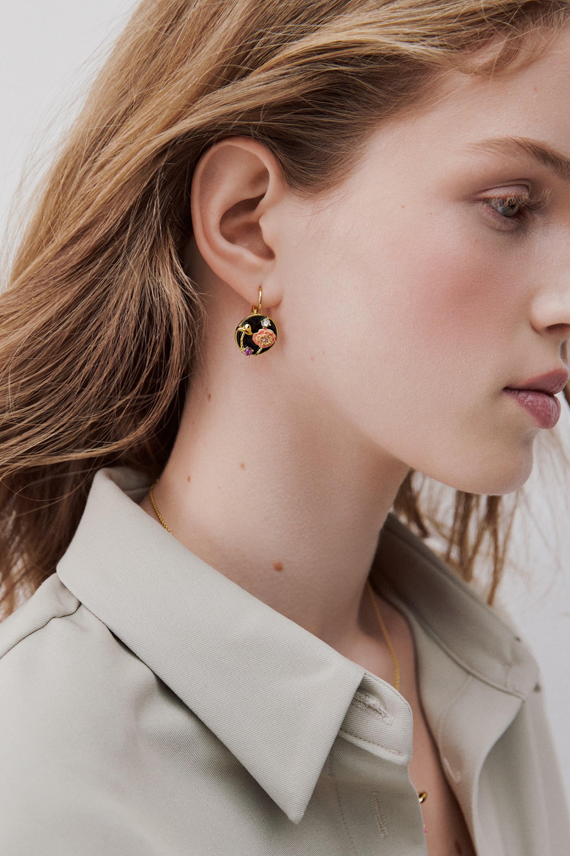 Black medallion sleeper earrings with mushroom, anemone and crystals