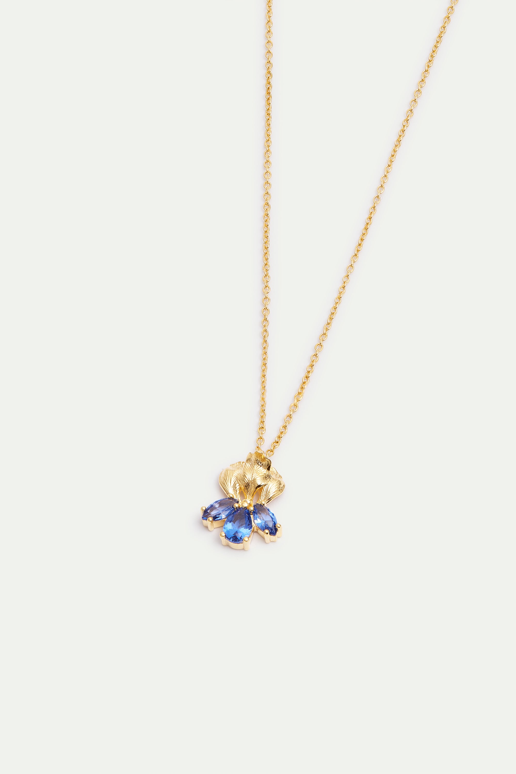 Golden iris and blue stone pendant necklace
