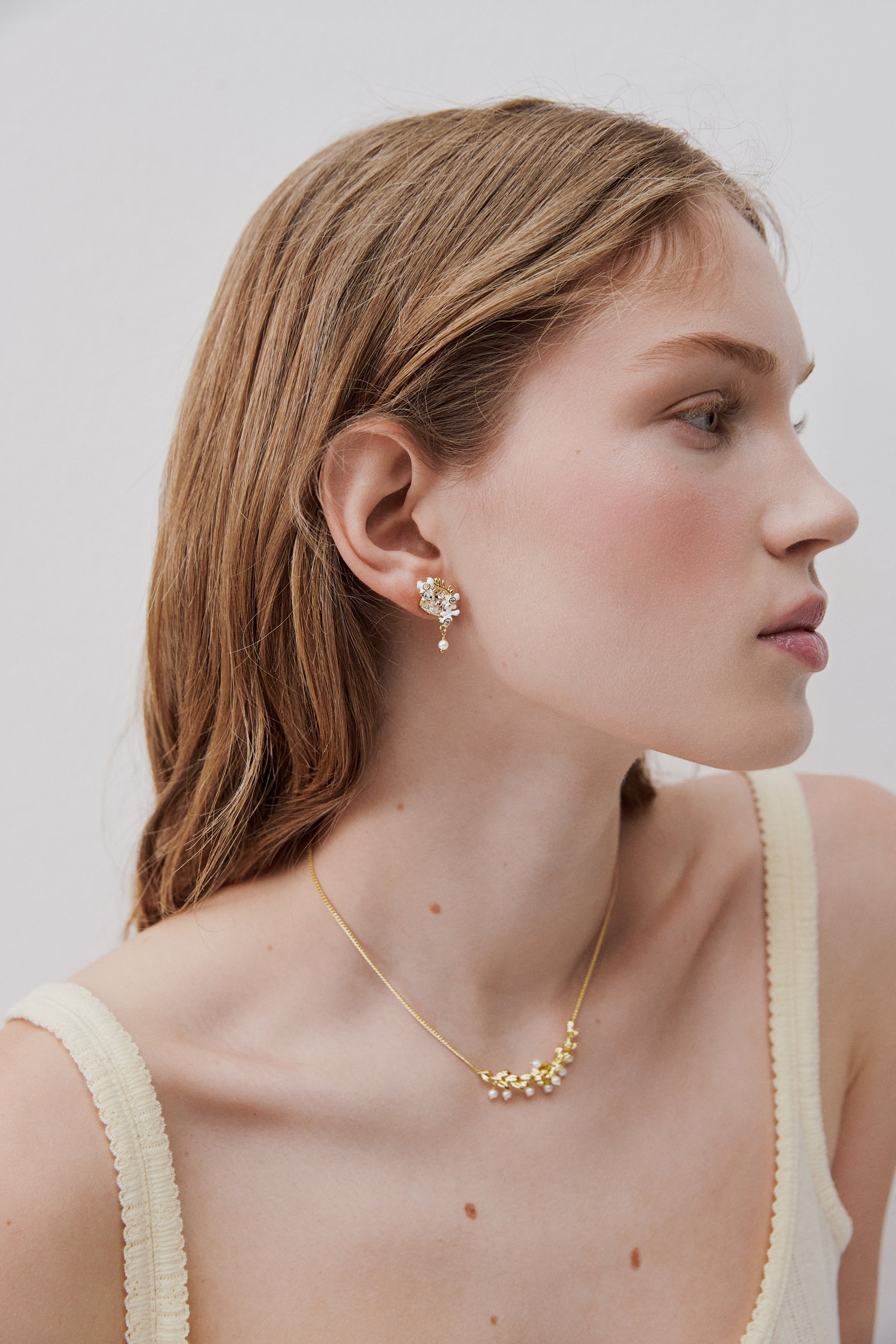 Gold and white statement necklace with laurel and cultured pearl