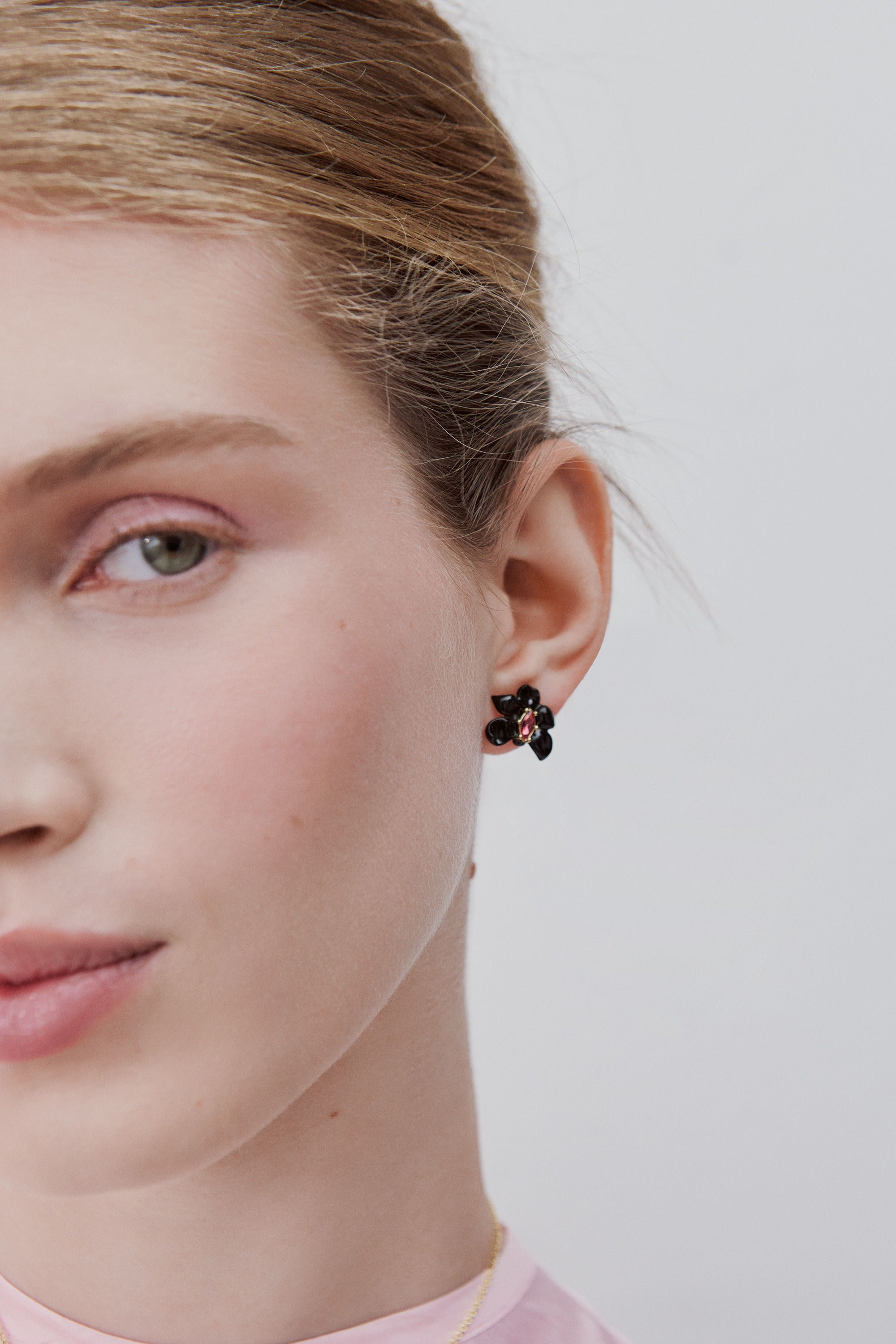 Post earrings with black orchid and pink faceted crystal