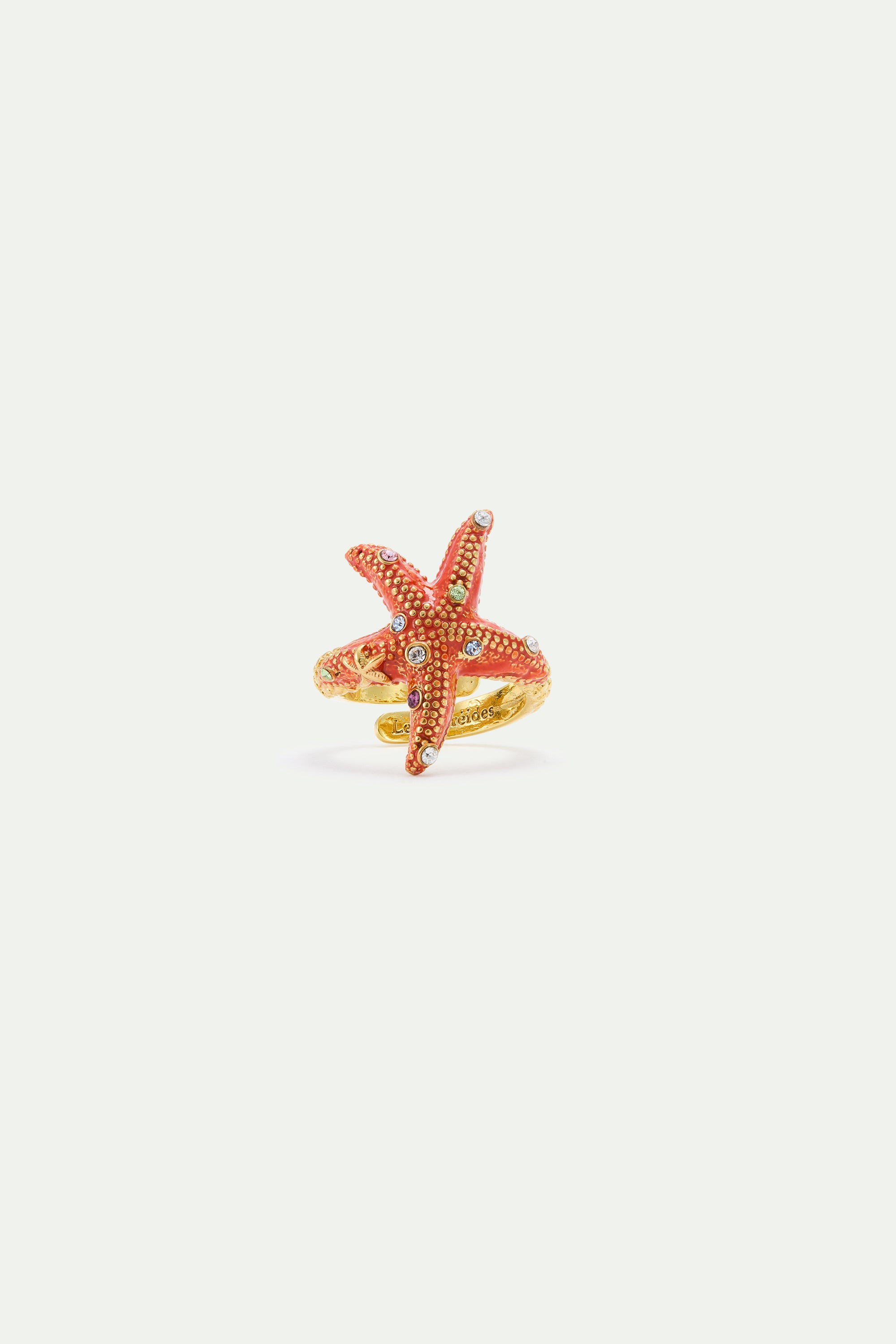 Adjustable orange starfish ring with multicoloured crystals