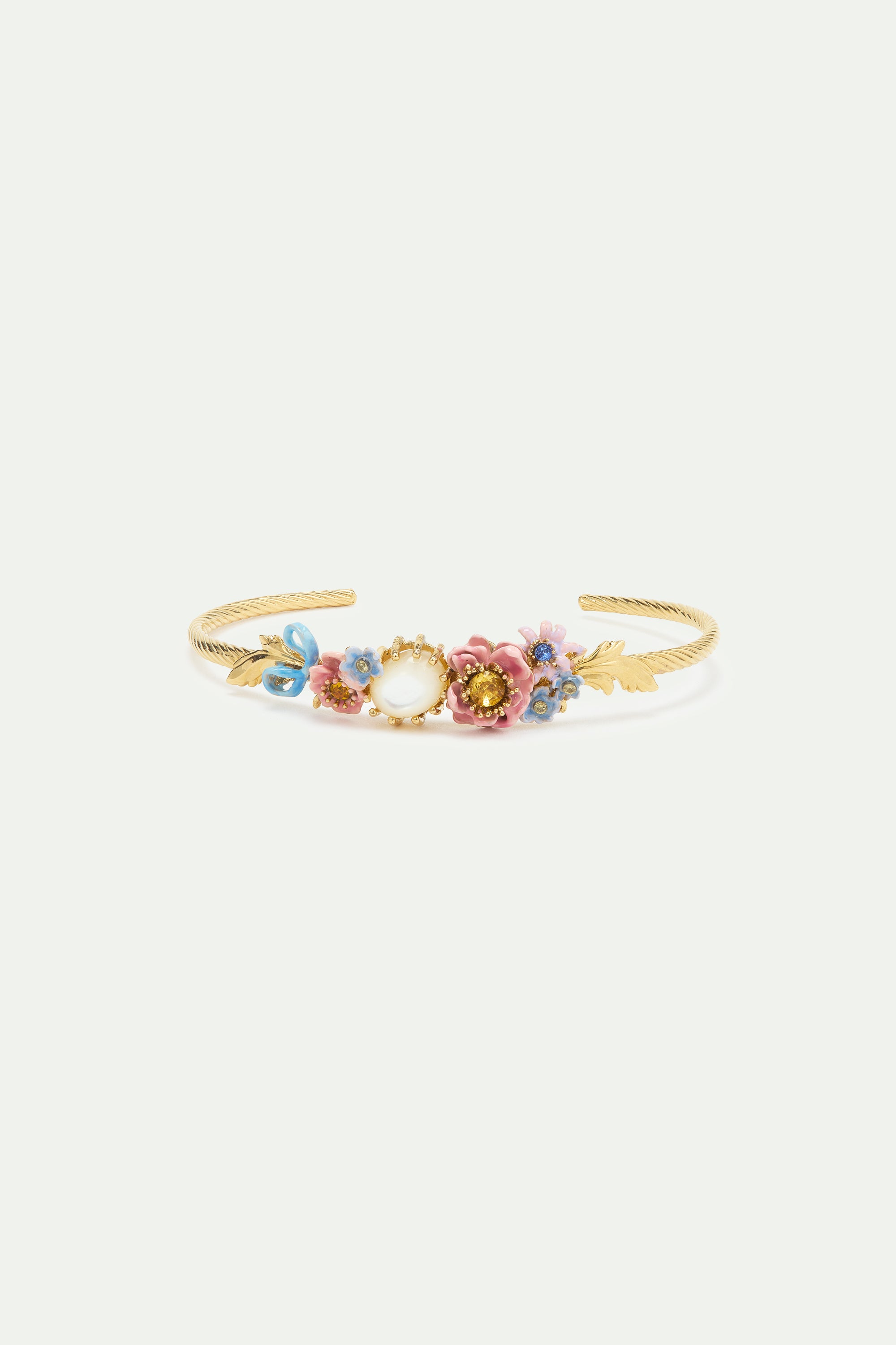Bangle bracelet adorned with pink and blue flower and mother of pearl round stone