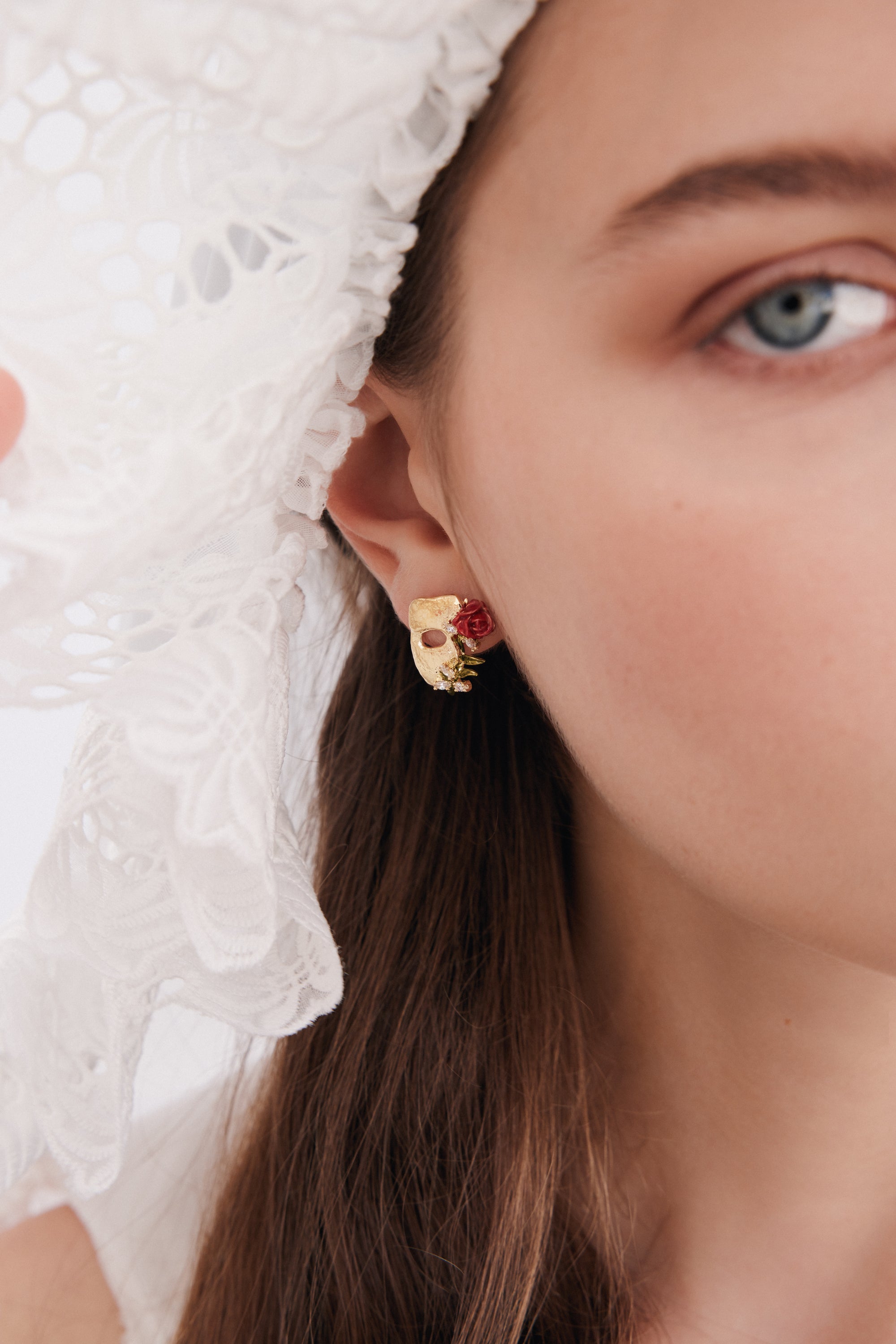 Gold mask, rose and crystal post earrings