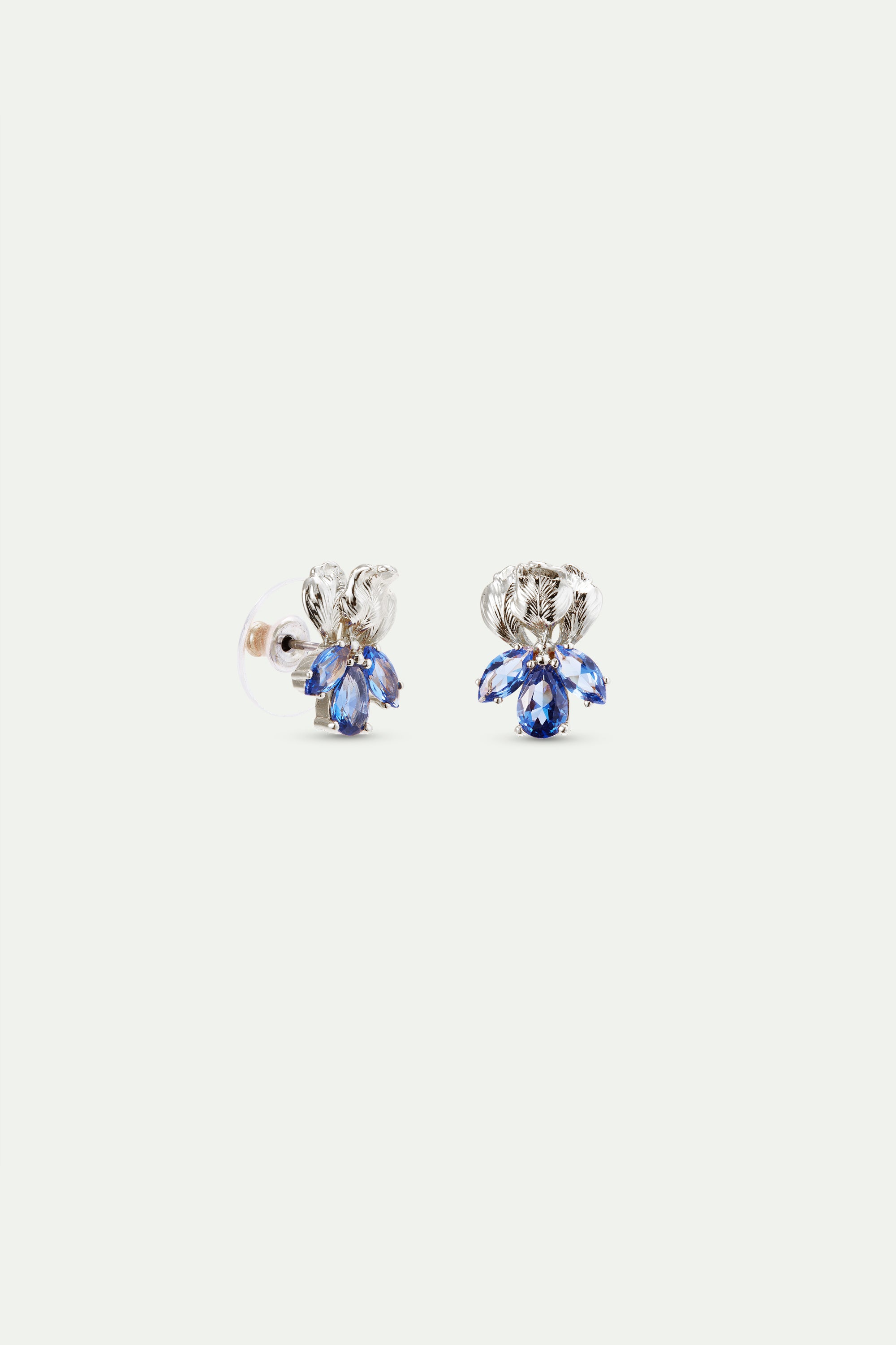 Silver iris and blue stone post earrings