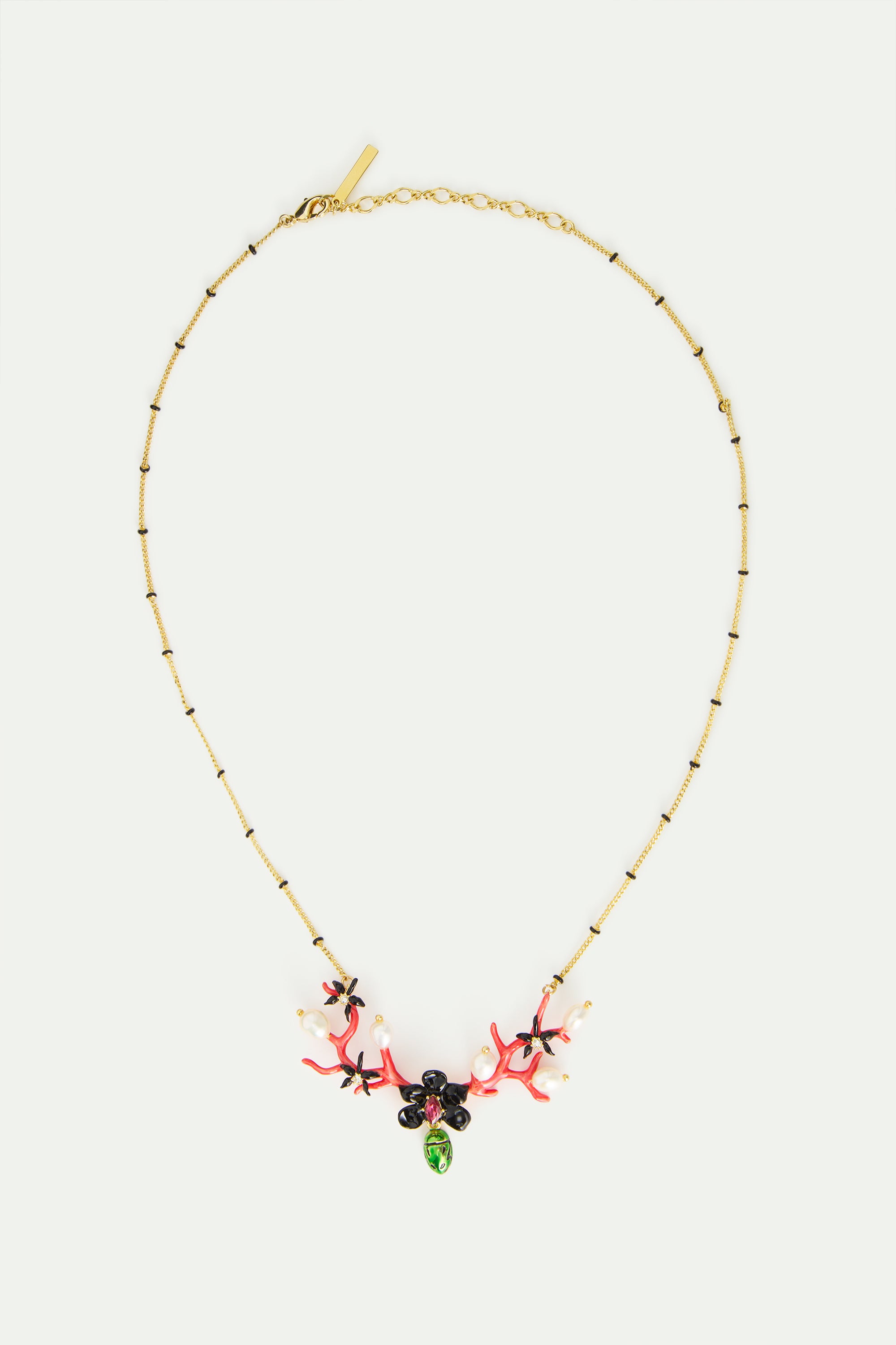 Statement necklace with black orchid, red coral, dangling green rose chafer and cultured pearls