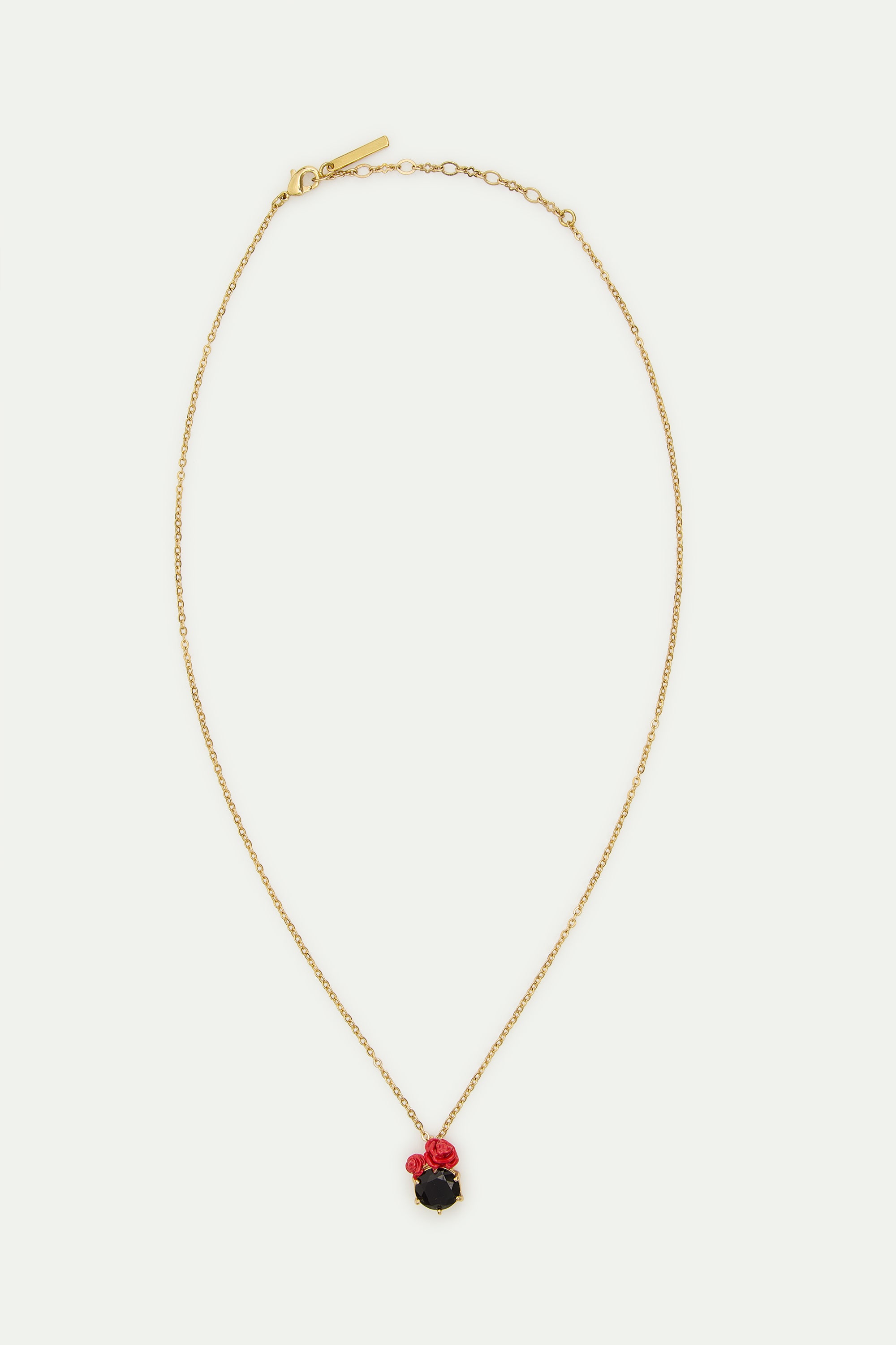 Black faceted stone and red rose pendant necklace