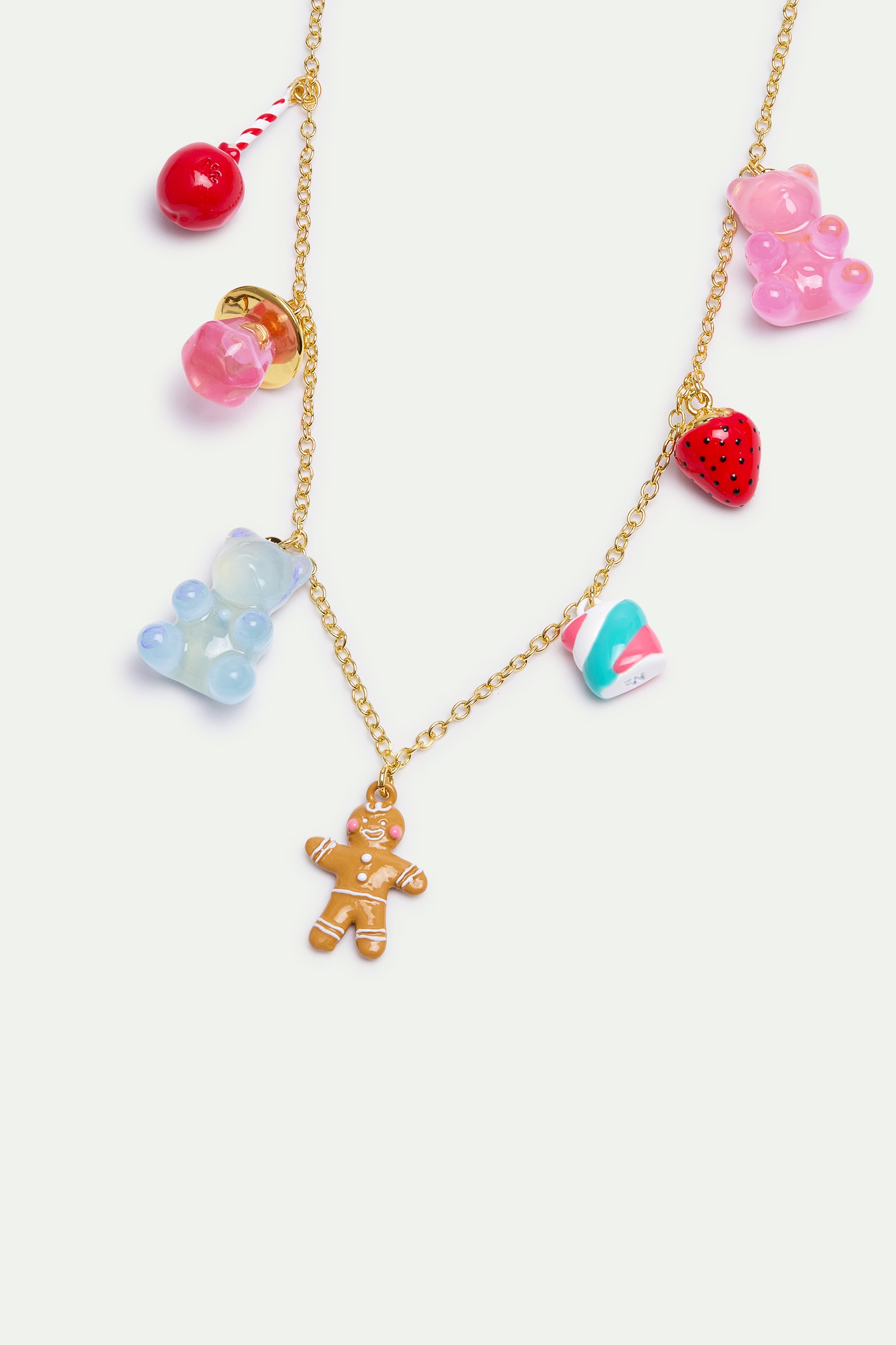 Gingerbread man pendant necklace, marshmallow bear, lollipop and strawberry