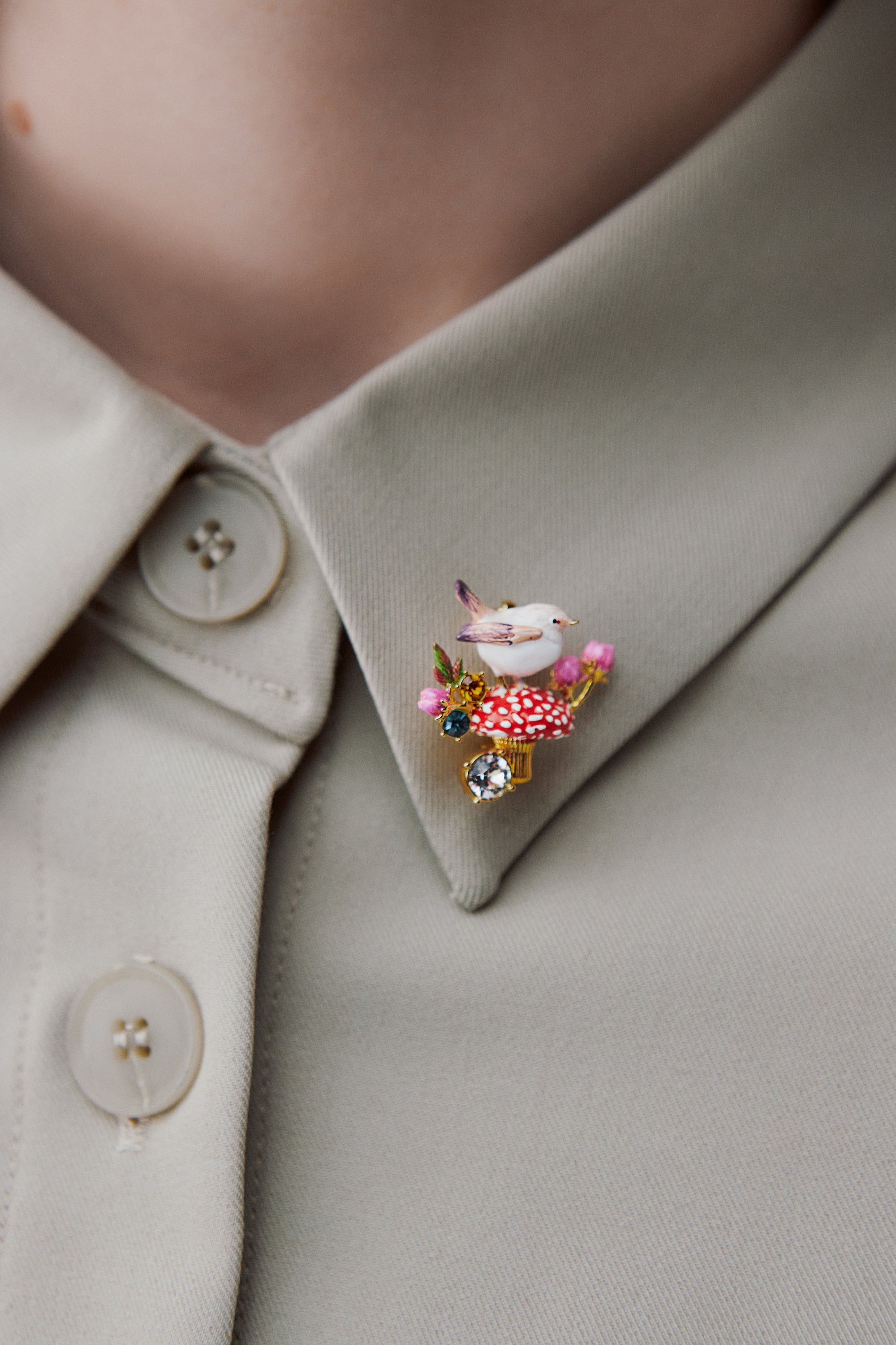Snow bunting brooch with mushroom, rosebud and crystals