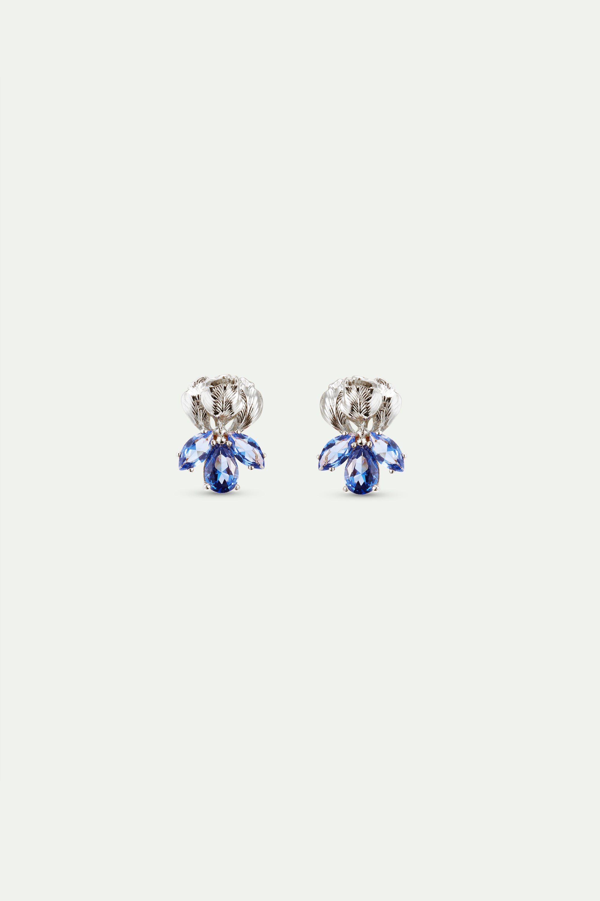 Silver iris and blue stone post earrings