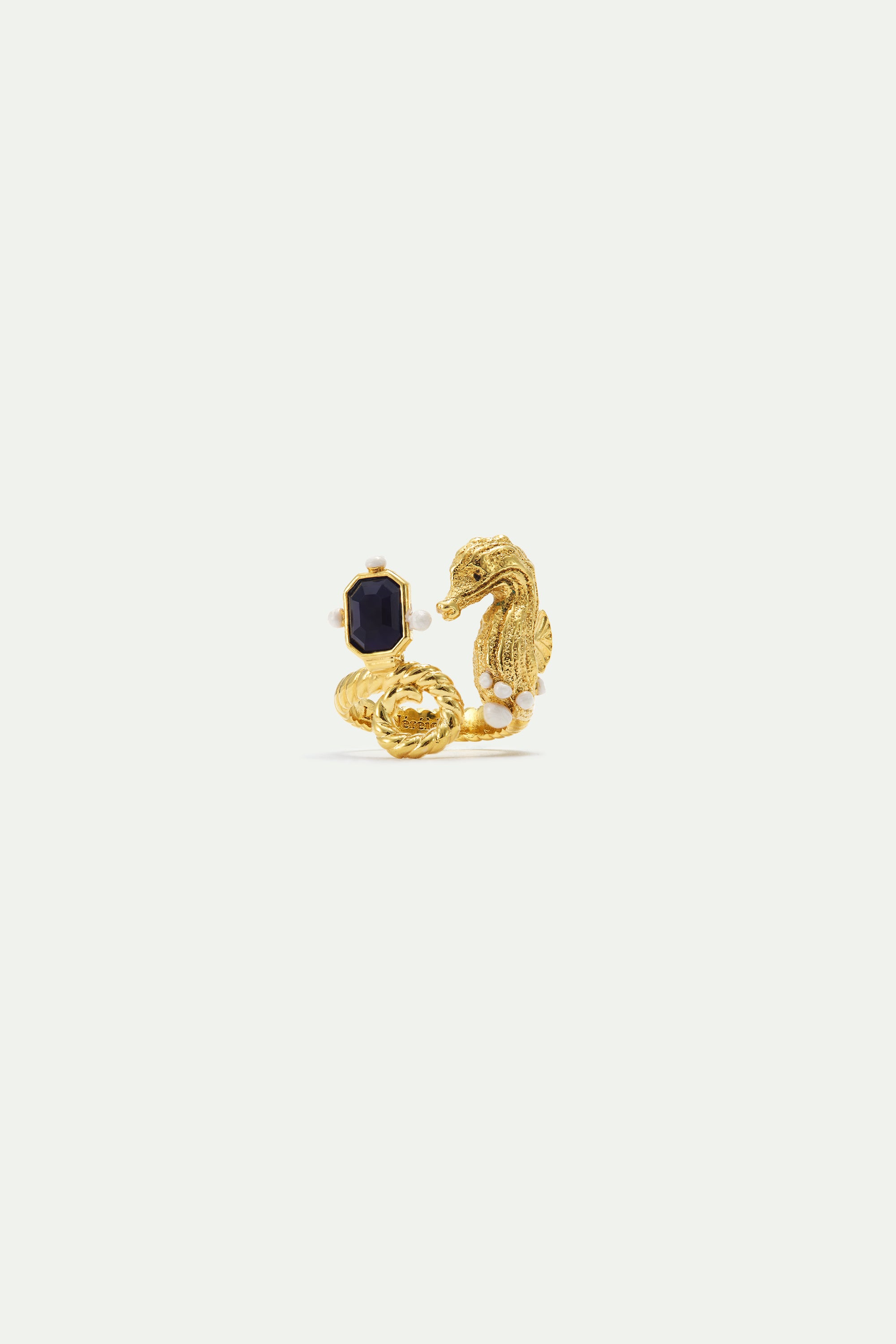 Adjustable ring with golden seahorse and navy blue stone