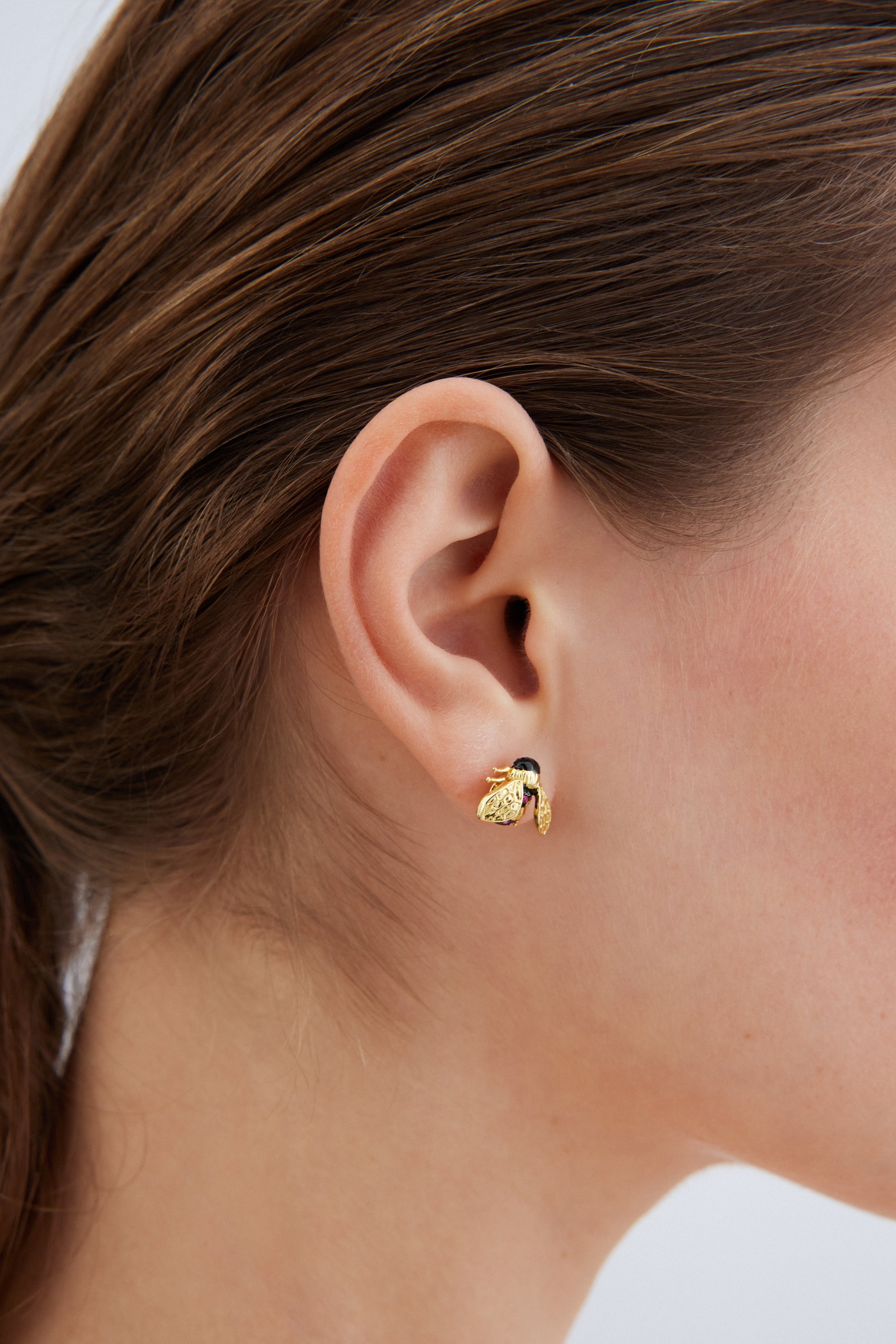 Gold bee and pink stone earrings
