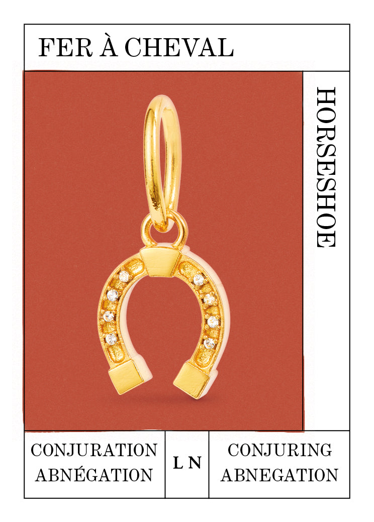 Gold-plated horseshoe pendant, Conjuring and Abnegation