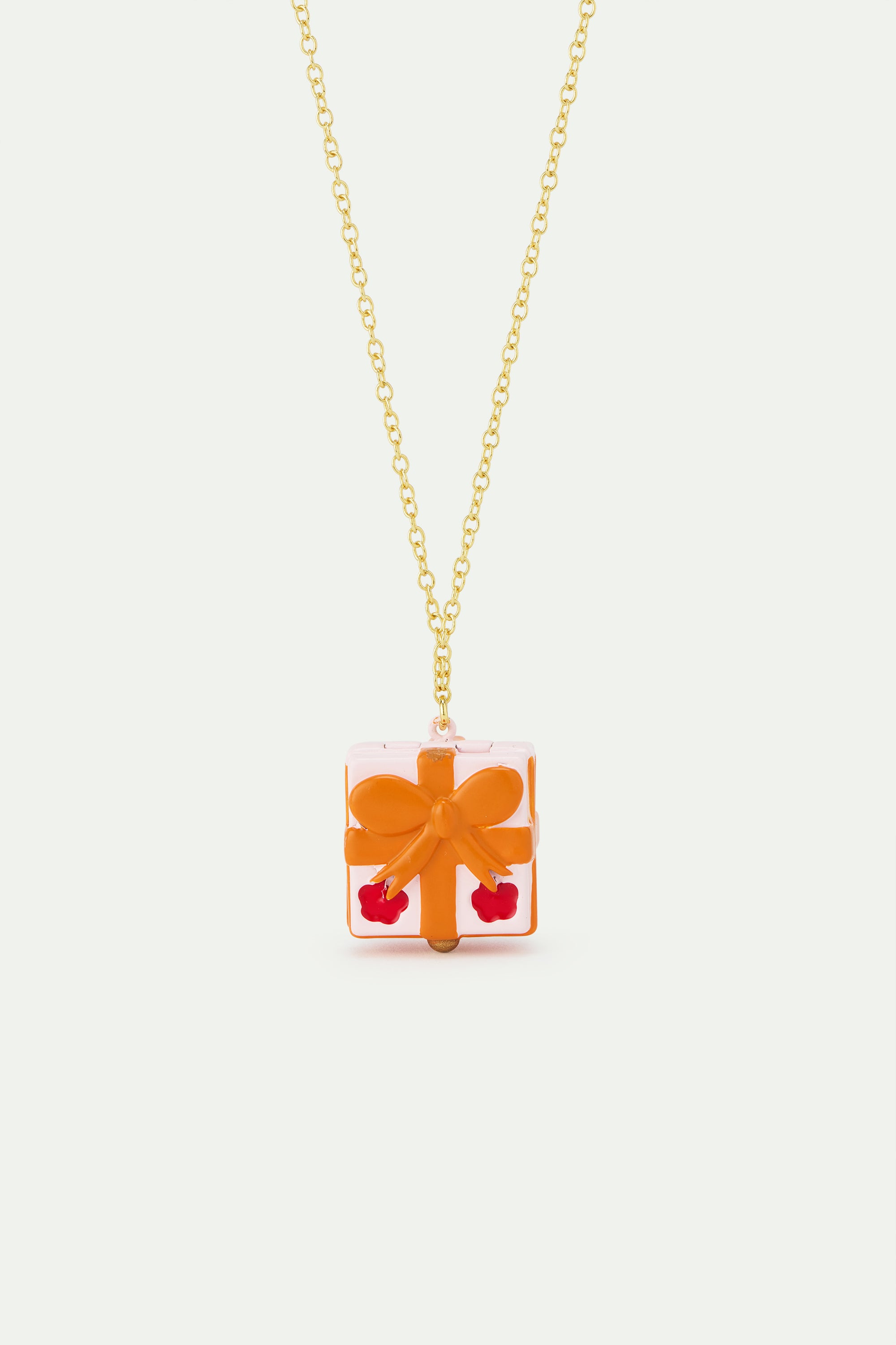 Pendant necklace with pink gift box, red flower and orange bow