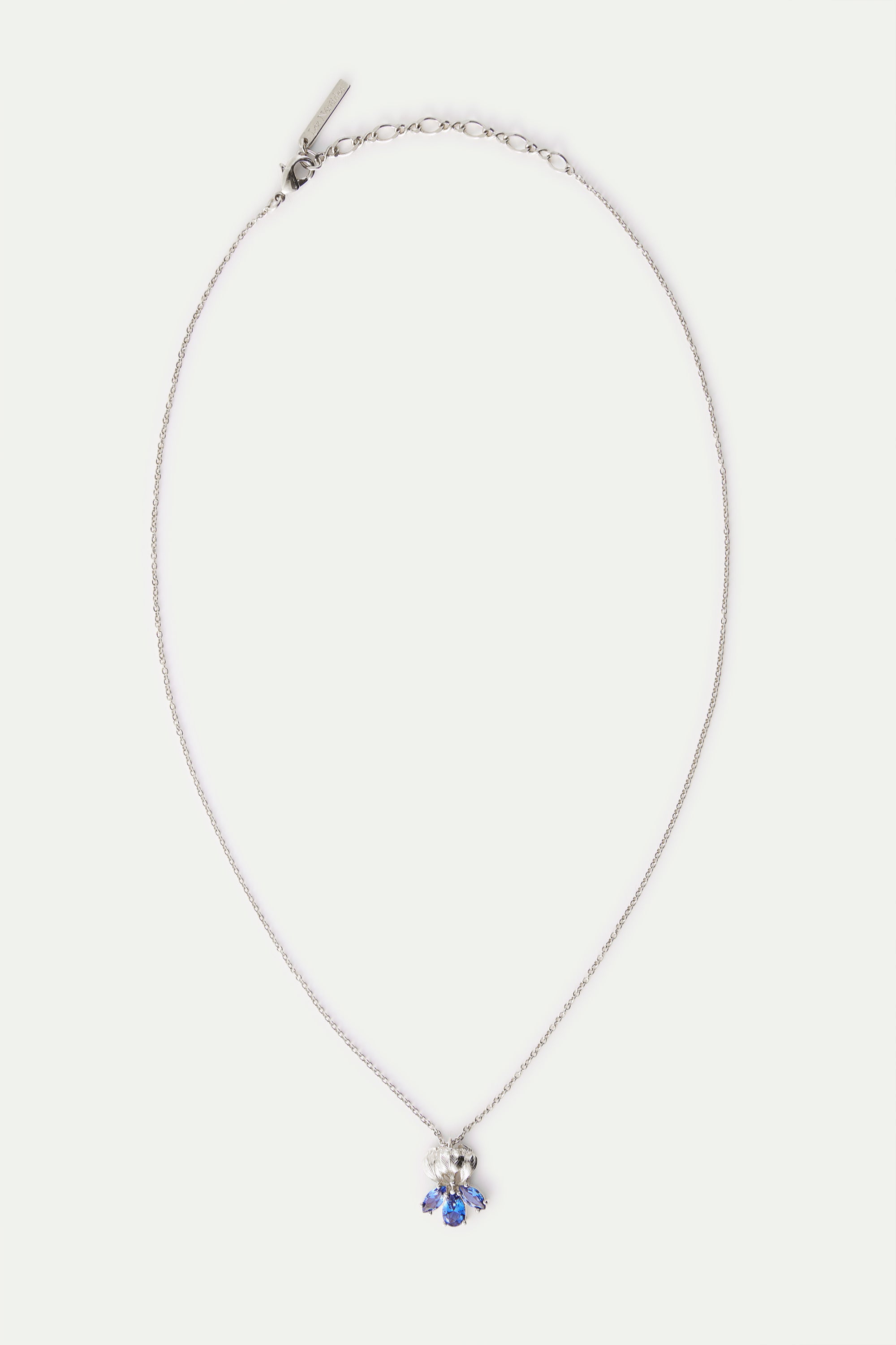 Silver iris and blue stone pendant necklace