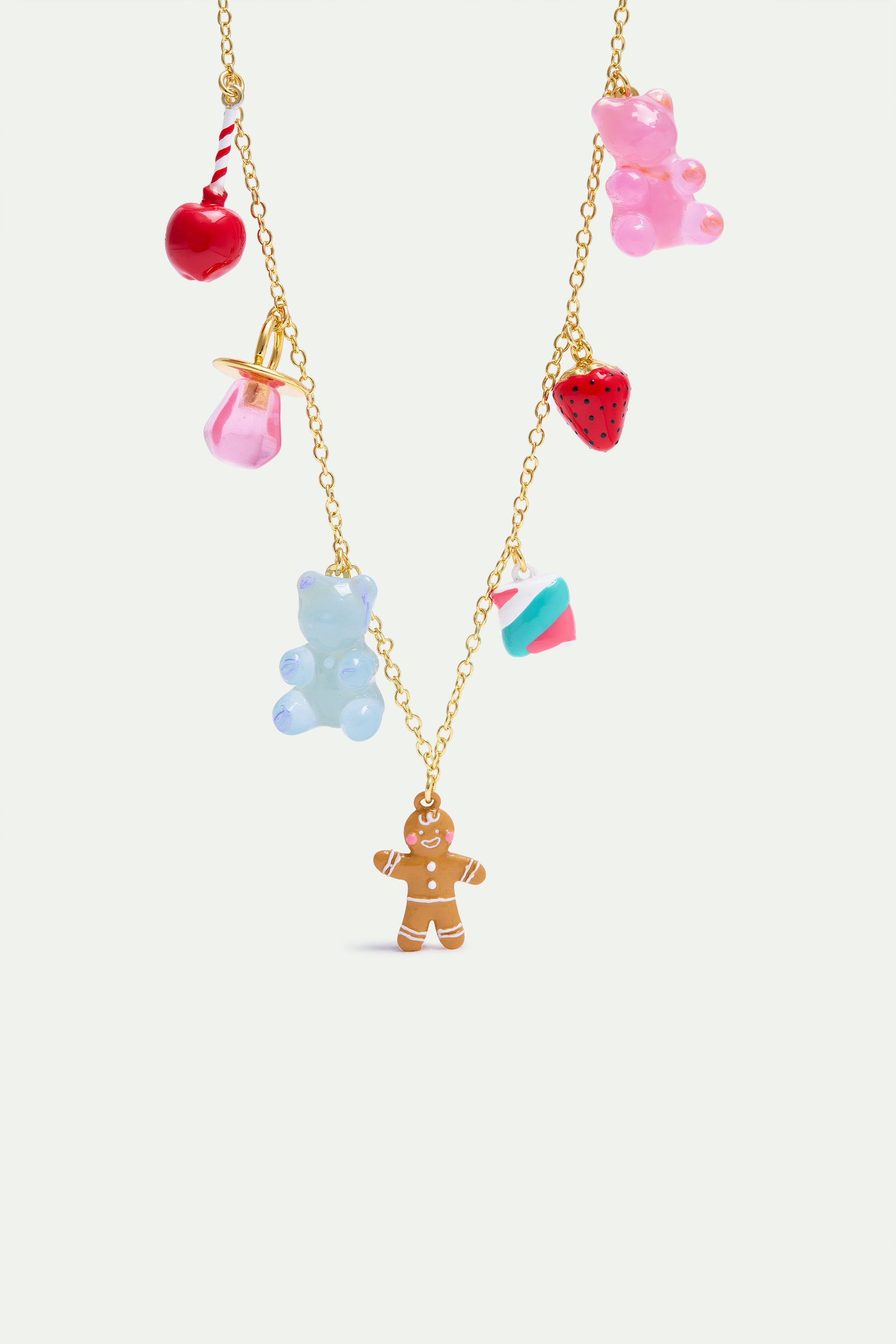 Gingerbread man pendant necklace, marshmallow bear, lollipop and strawberry