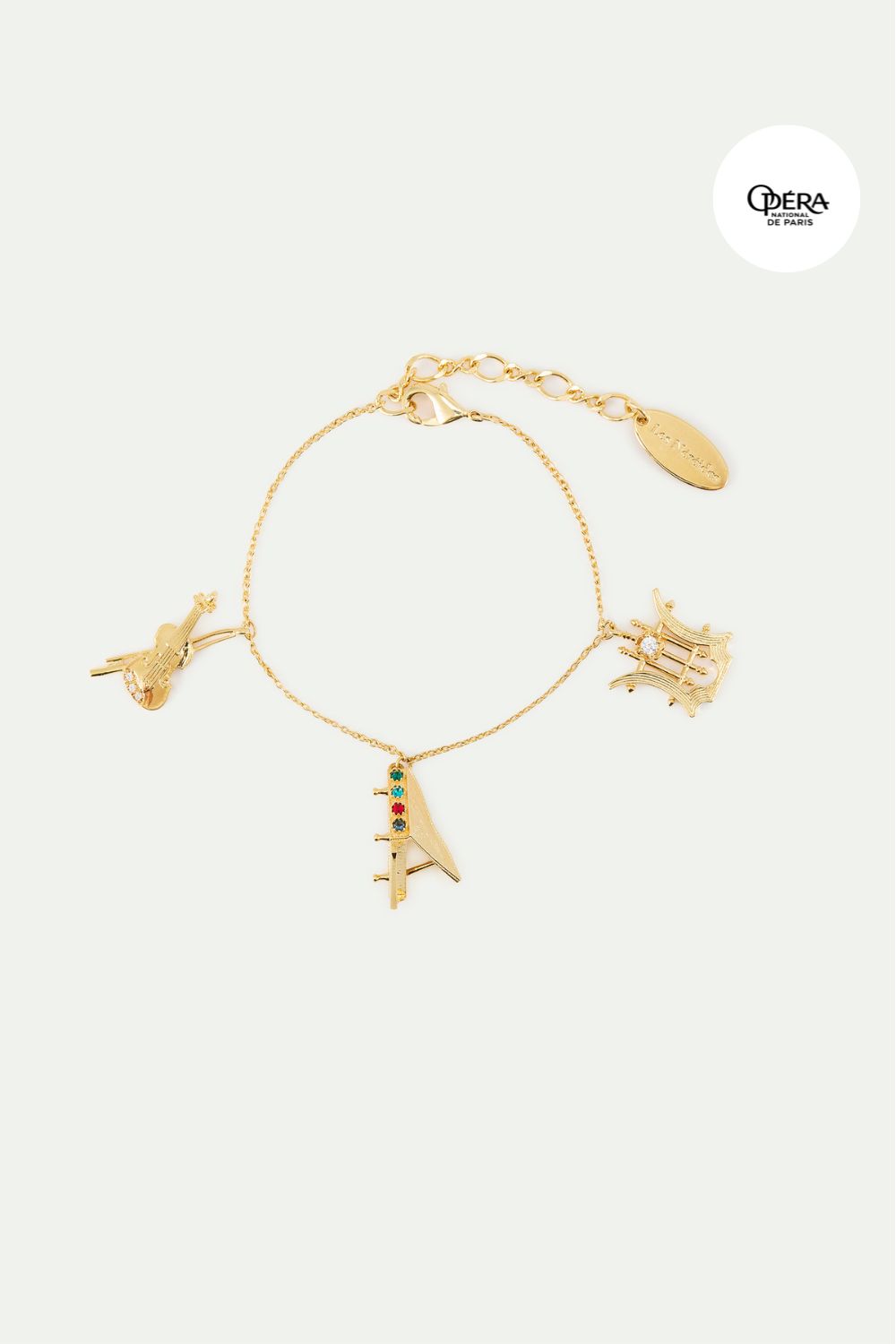 Gold musical instrument charm bracelet