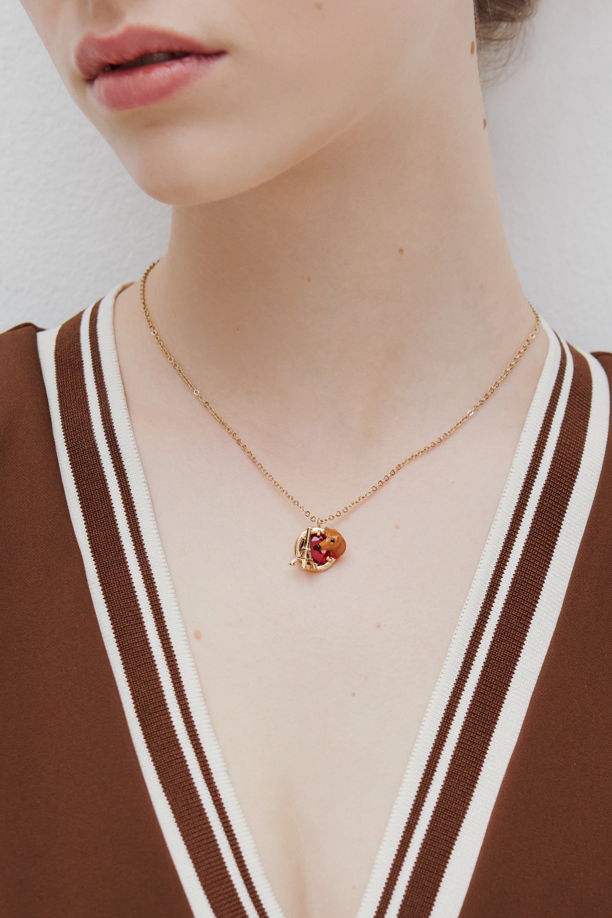 Dachshund pendant necklace with Eiffel tower and garnet red stone