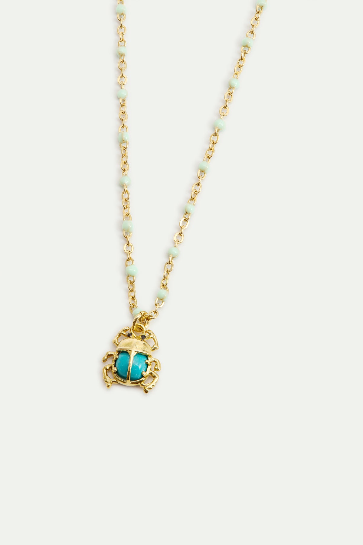 Collar colgante escarabajo turquesa y dorado