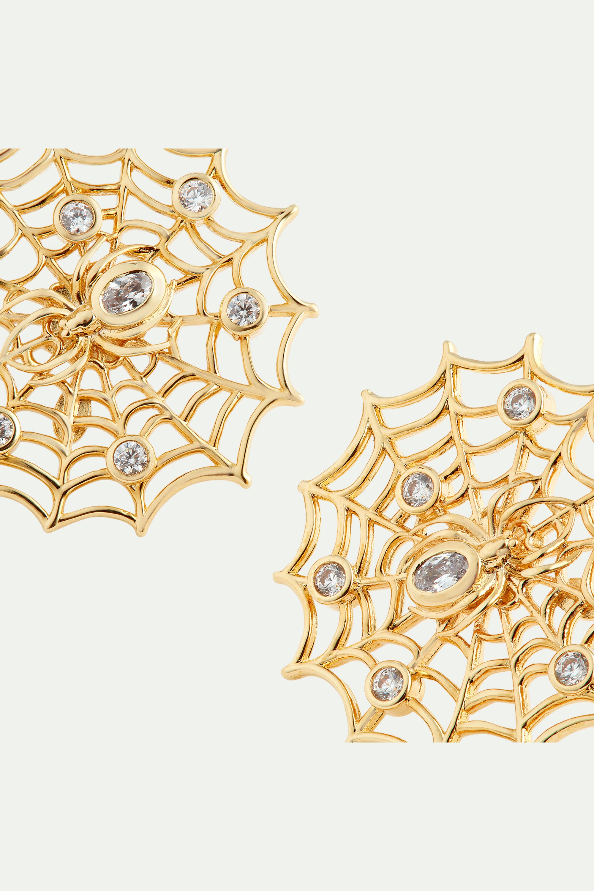 Pendientes de clip dorados tela de araña y cristales