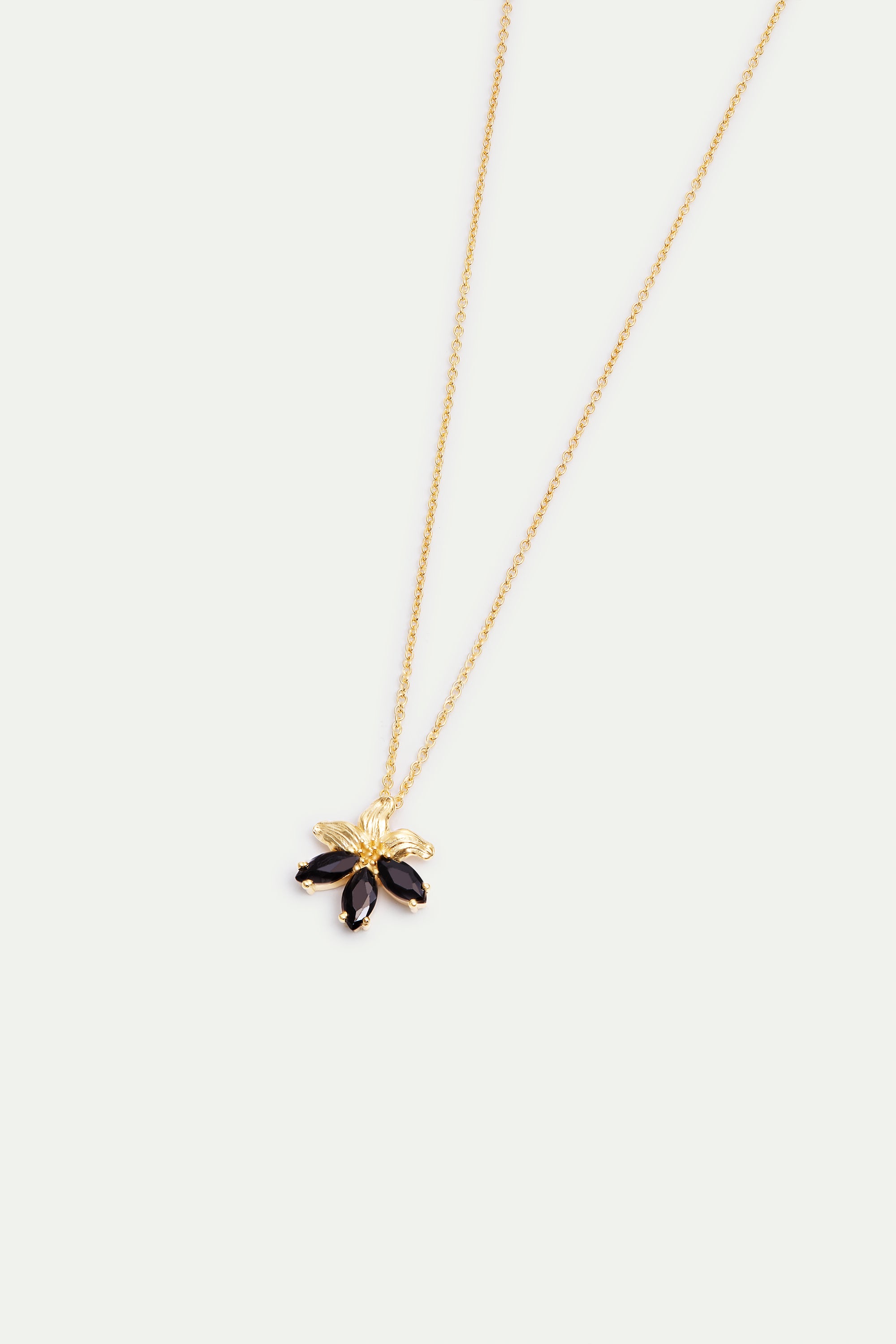 Golden lily and black stone pendant necklace