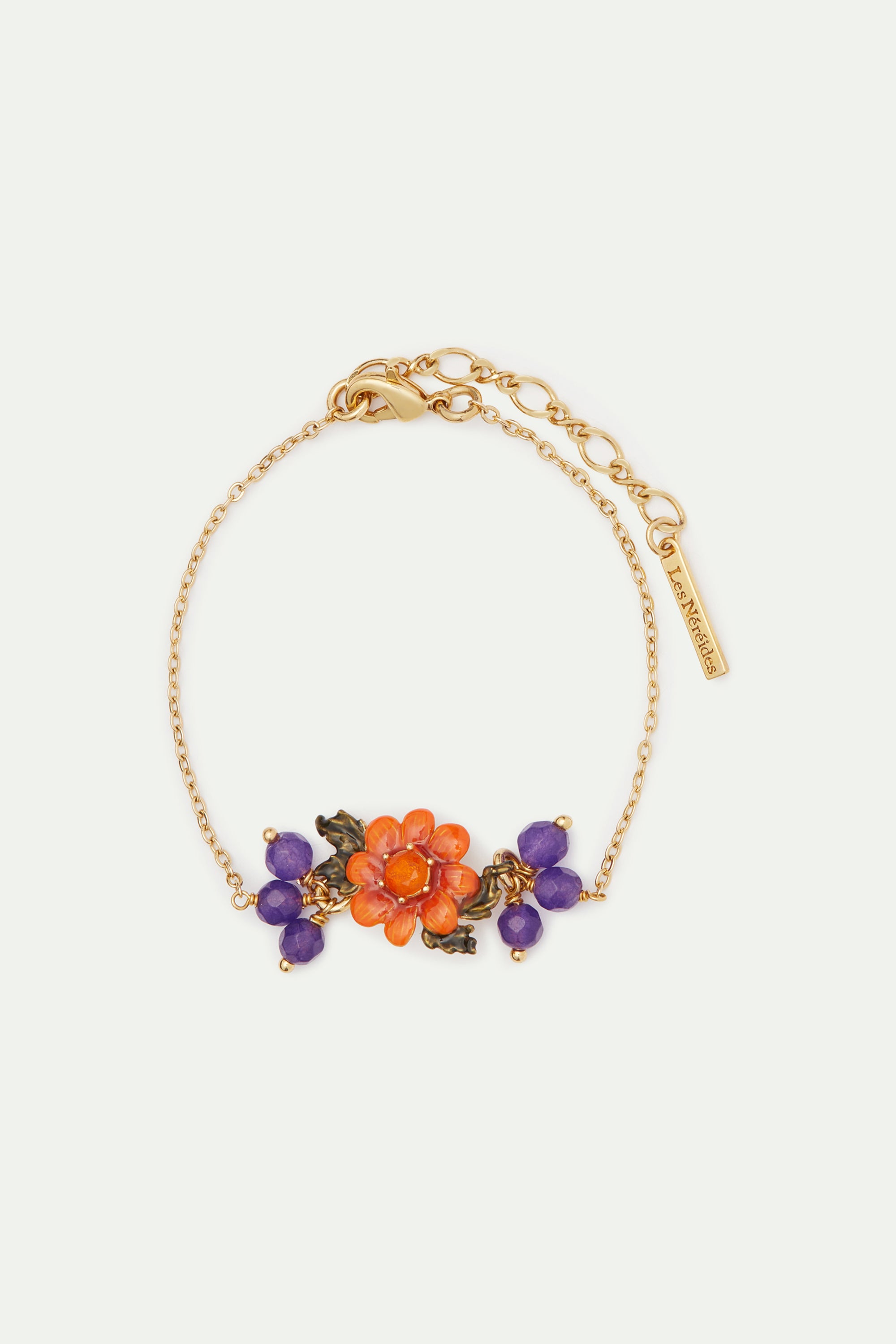 Pulsera fina de flores y cuentas de cristal.