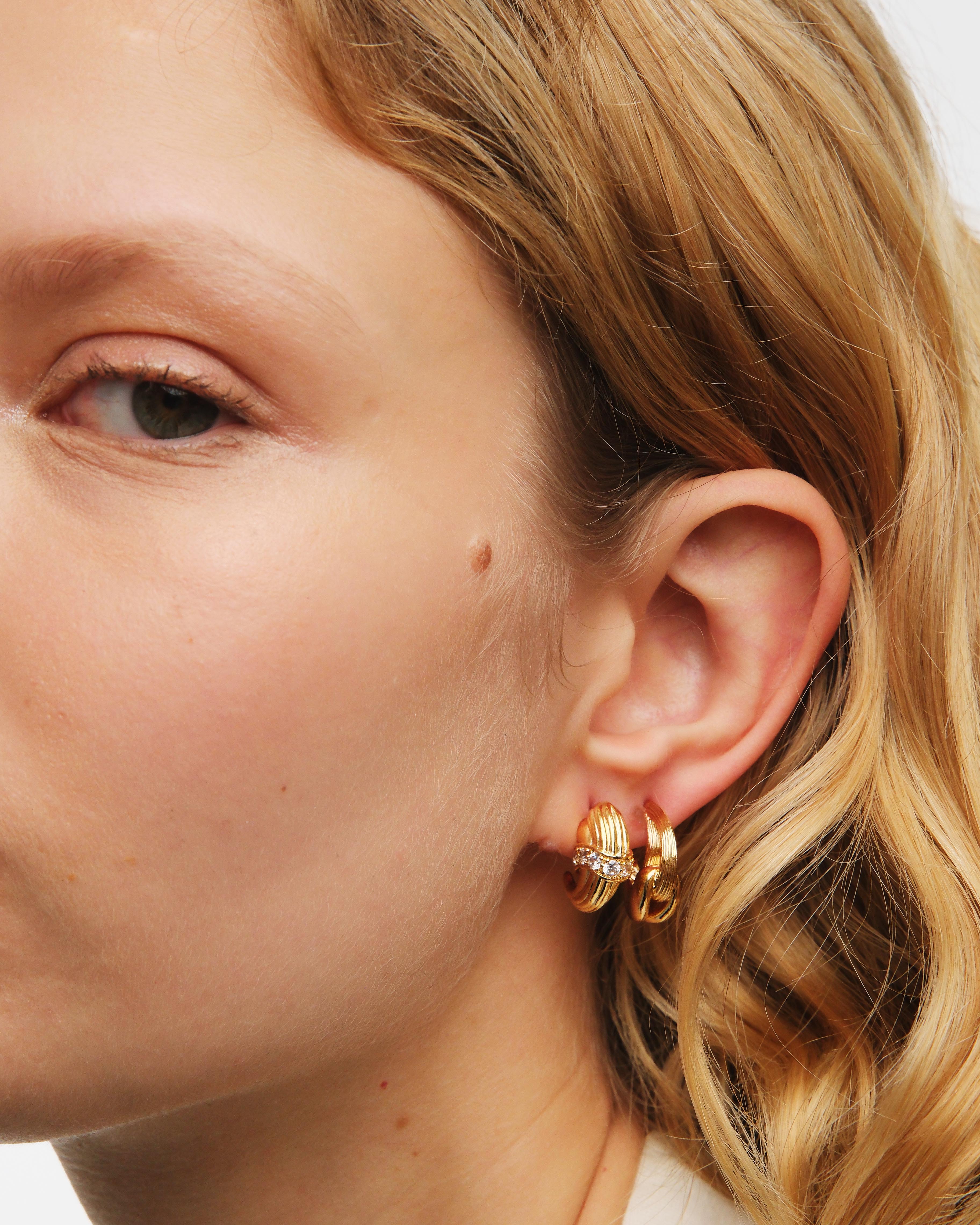 Gold and faceted glass hoop earrings