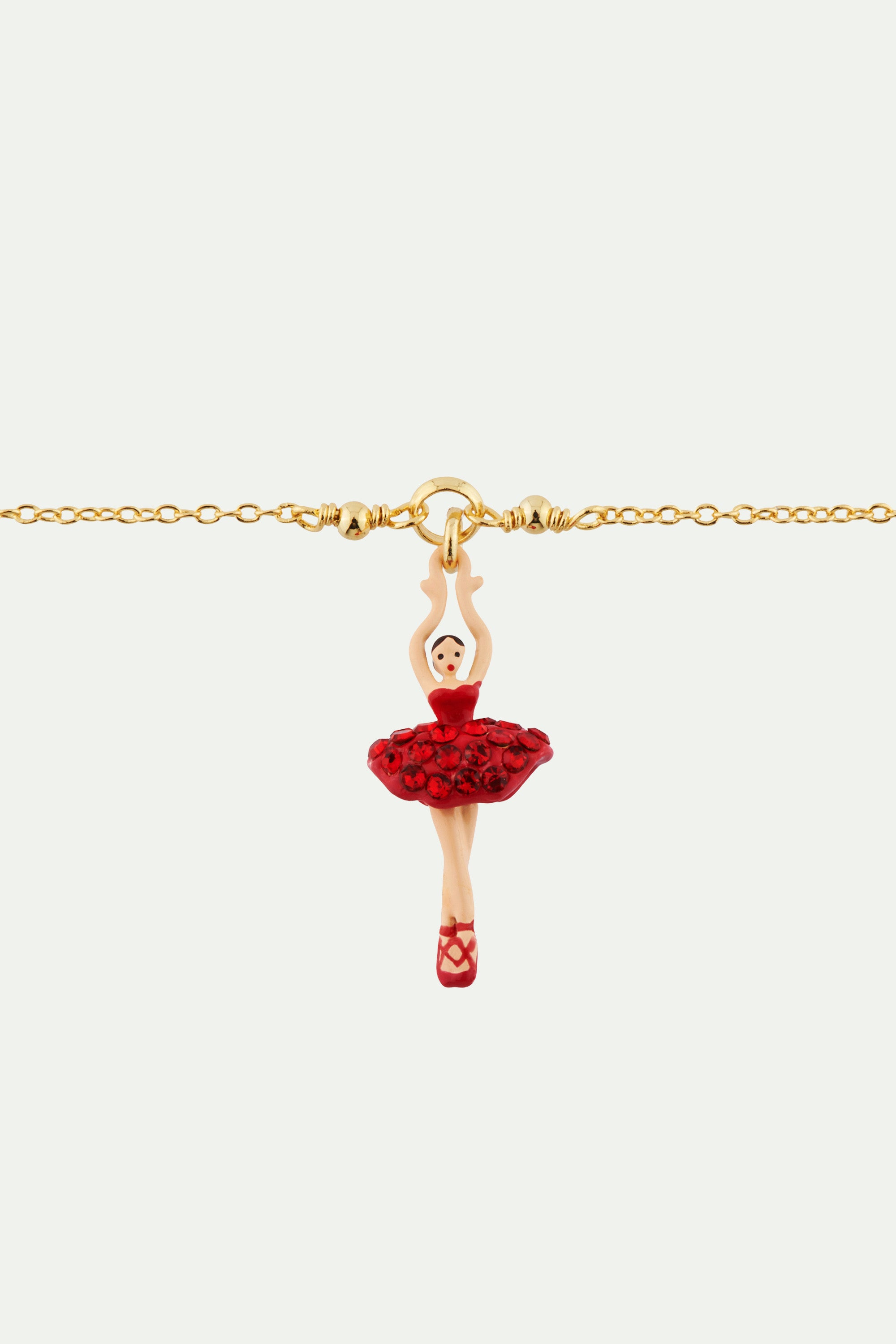 Bracelet mini-ballerina wearing a tutu paved with red rhinestones