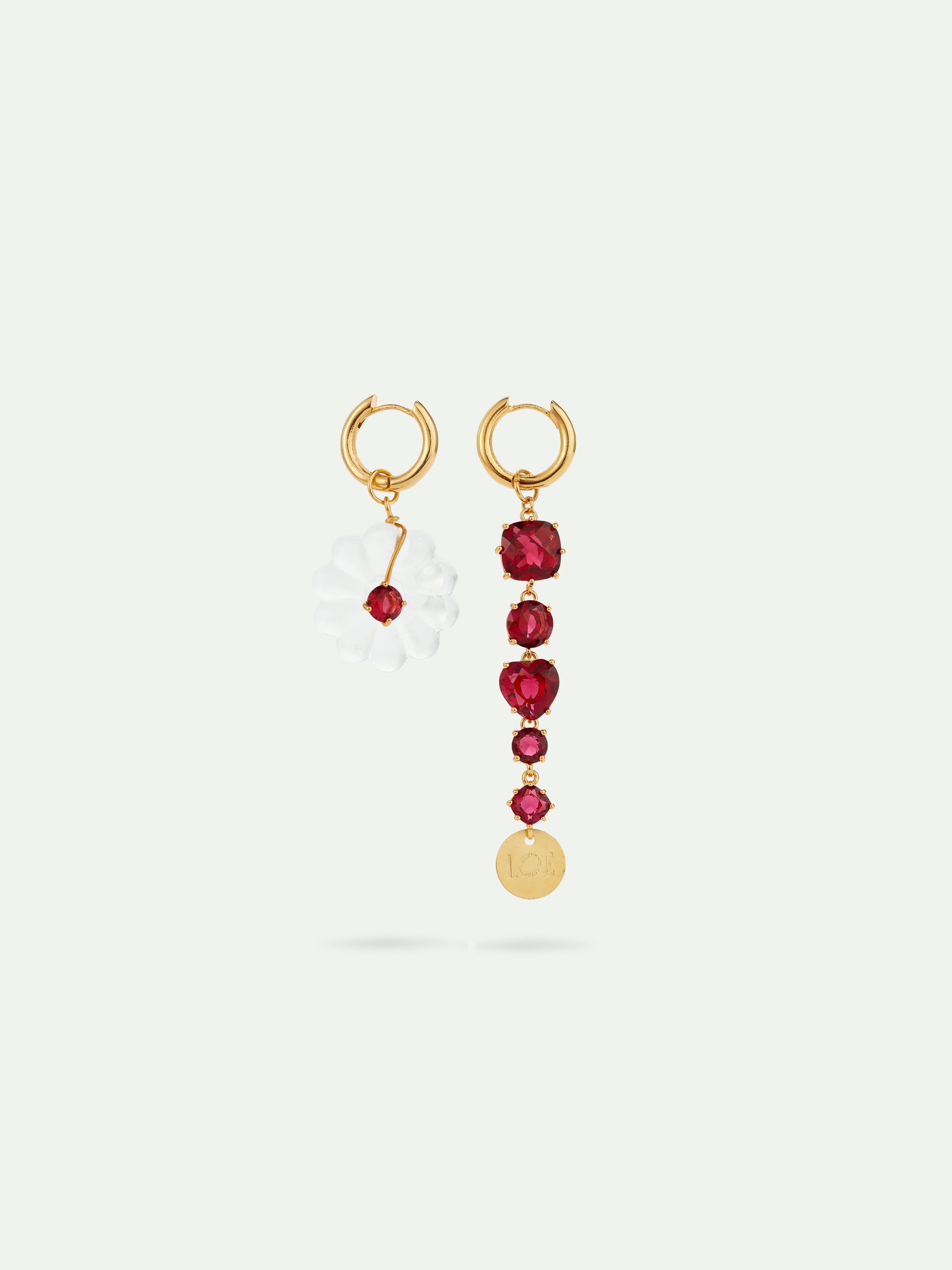 Asymmetrical garnet red faceted stones and white flower hoop earrings