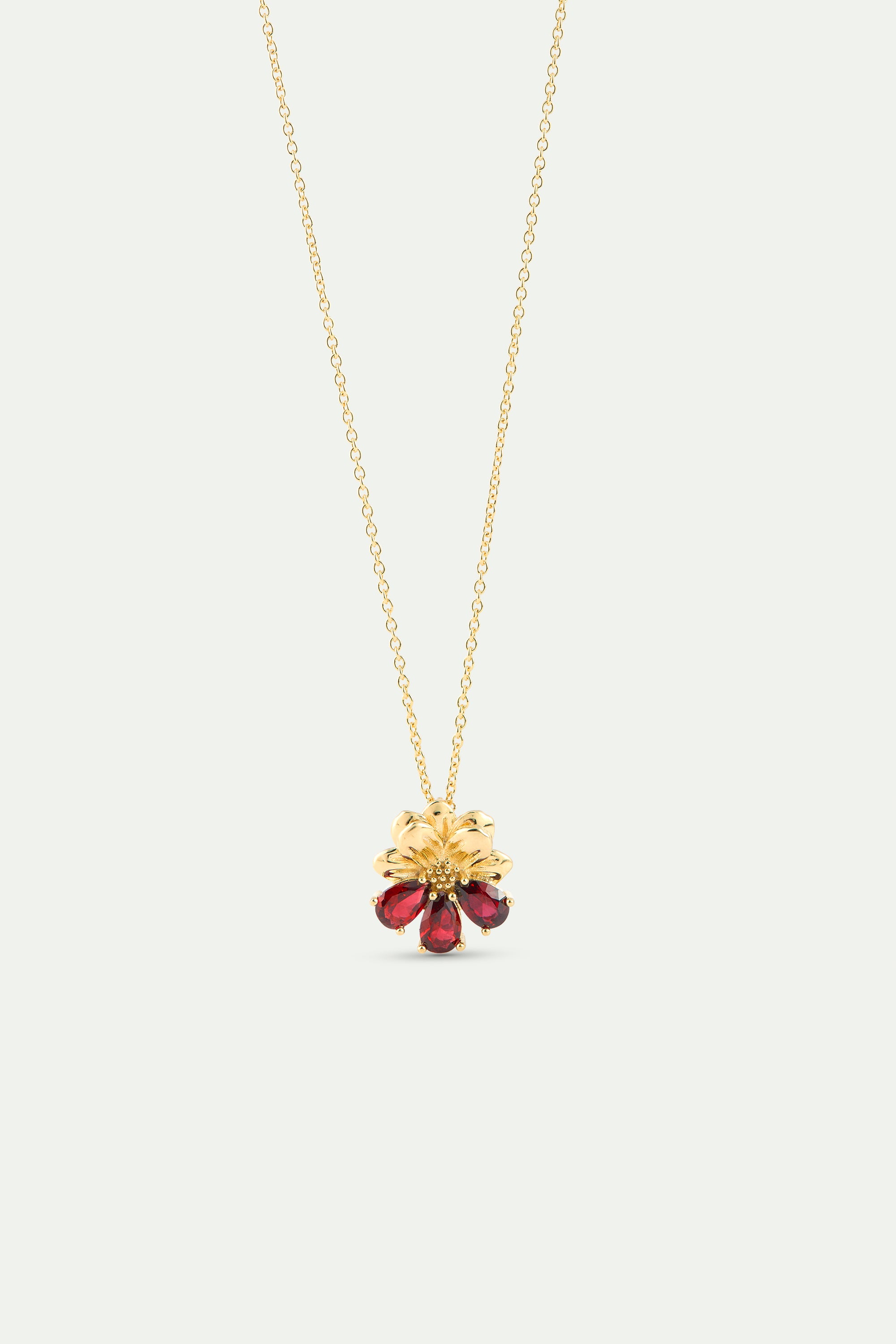 Collar con colgante cosmos y piedras rojas