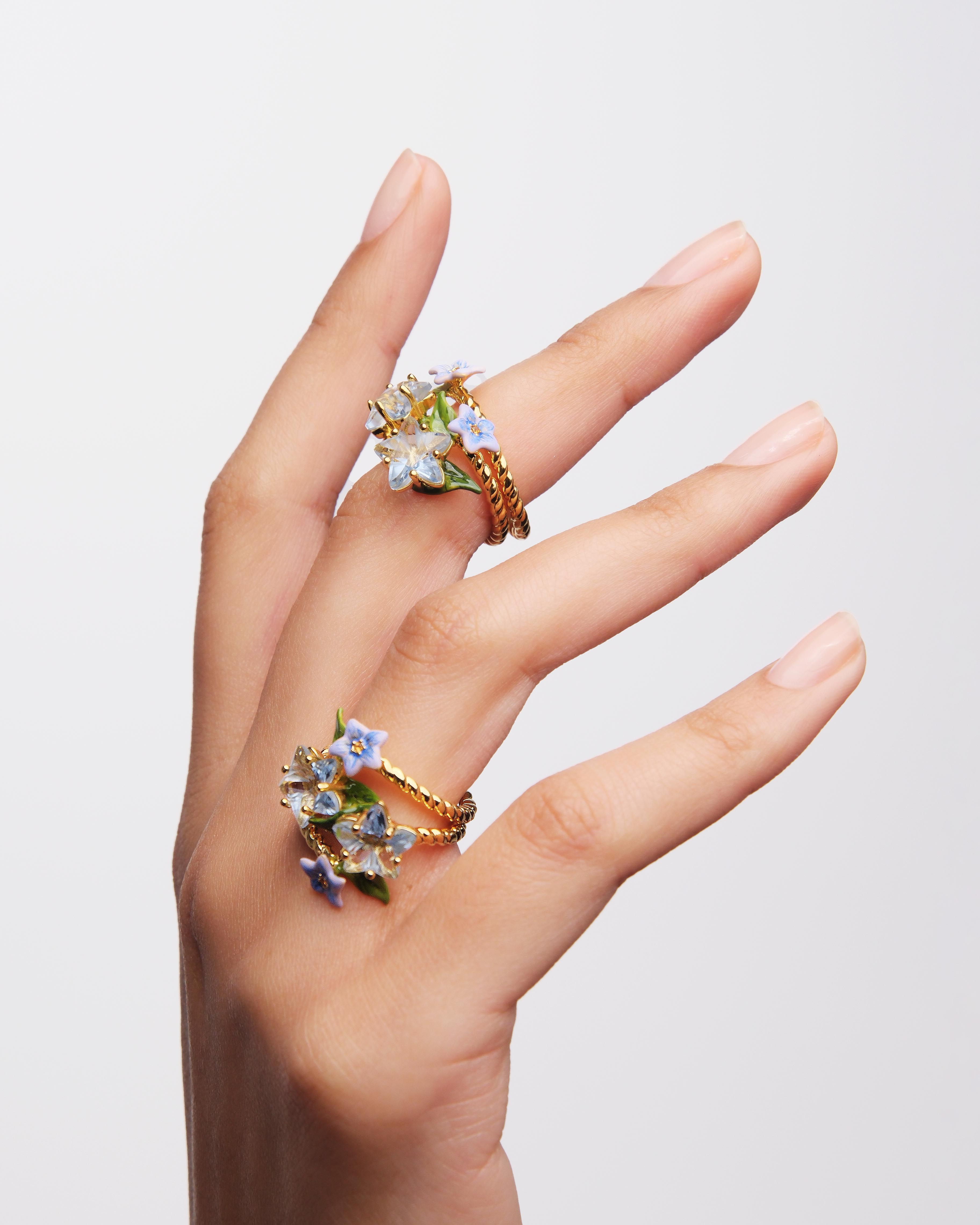 Faceted star and blue jasmine flower adjustable you and me ring