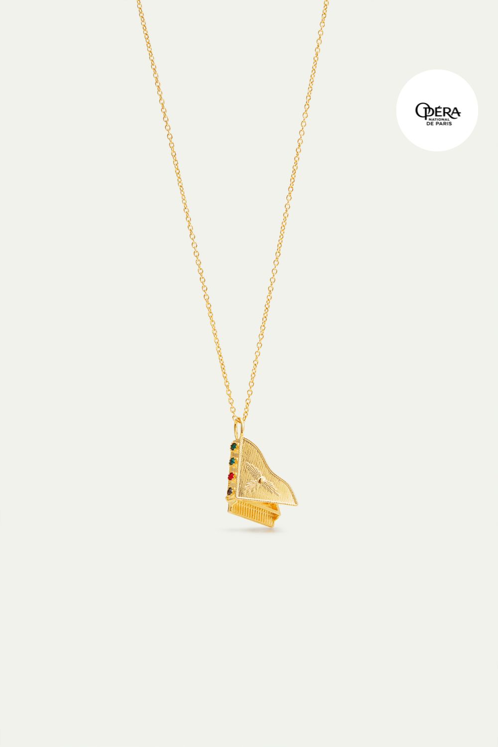 Gold piano pendant necklace