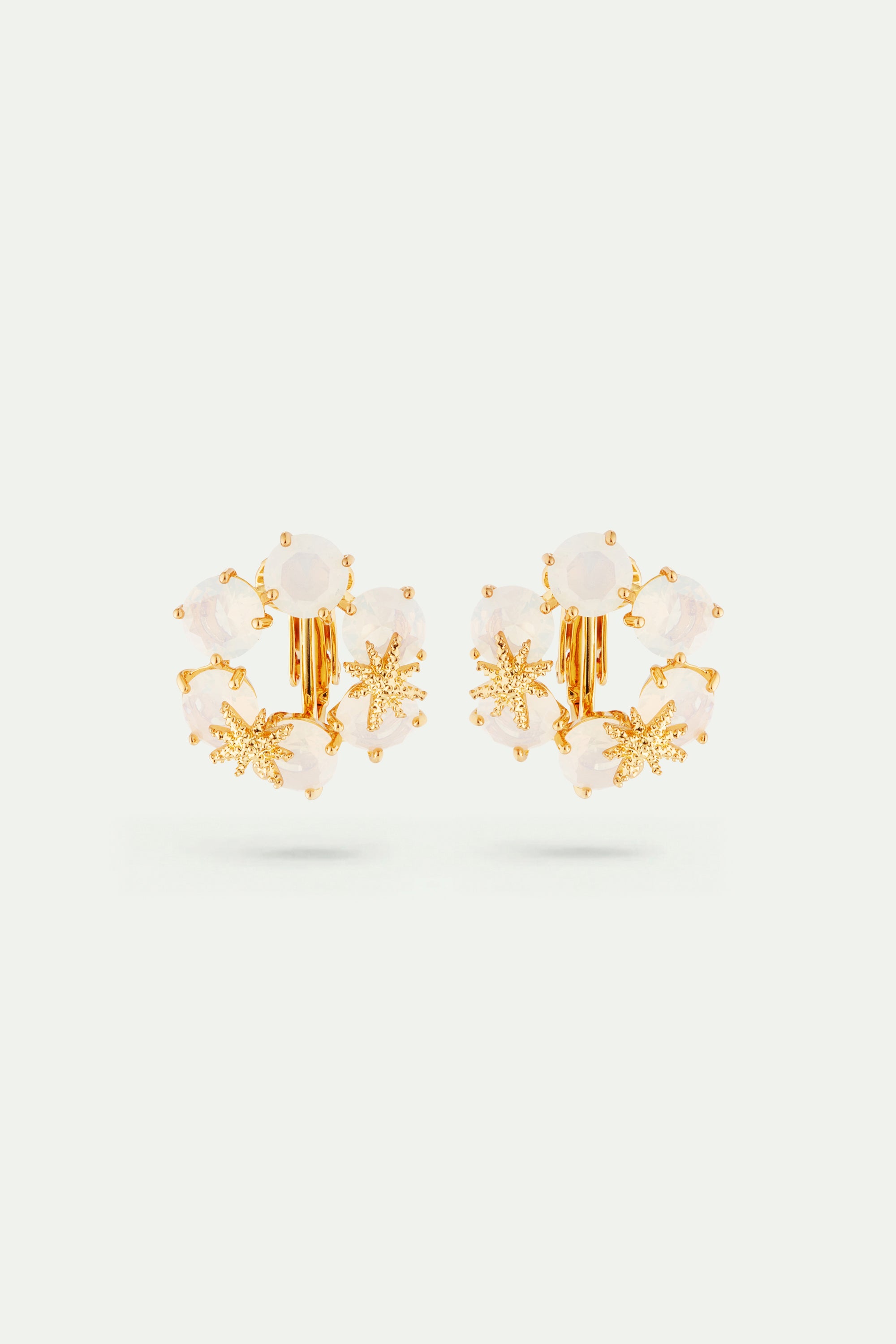 Opalescent white Diamantine six stone earrings with fine stars