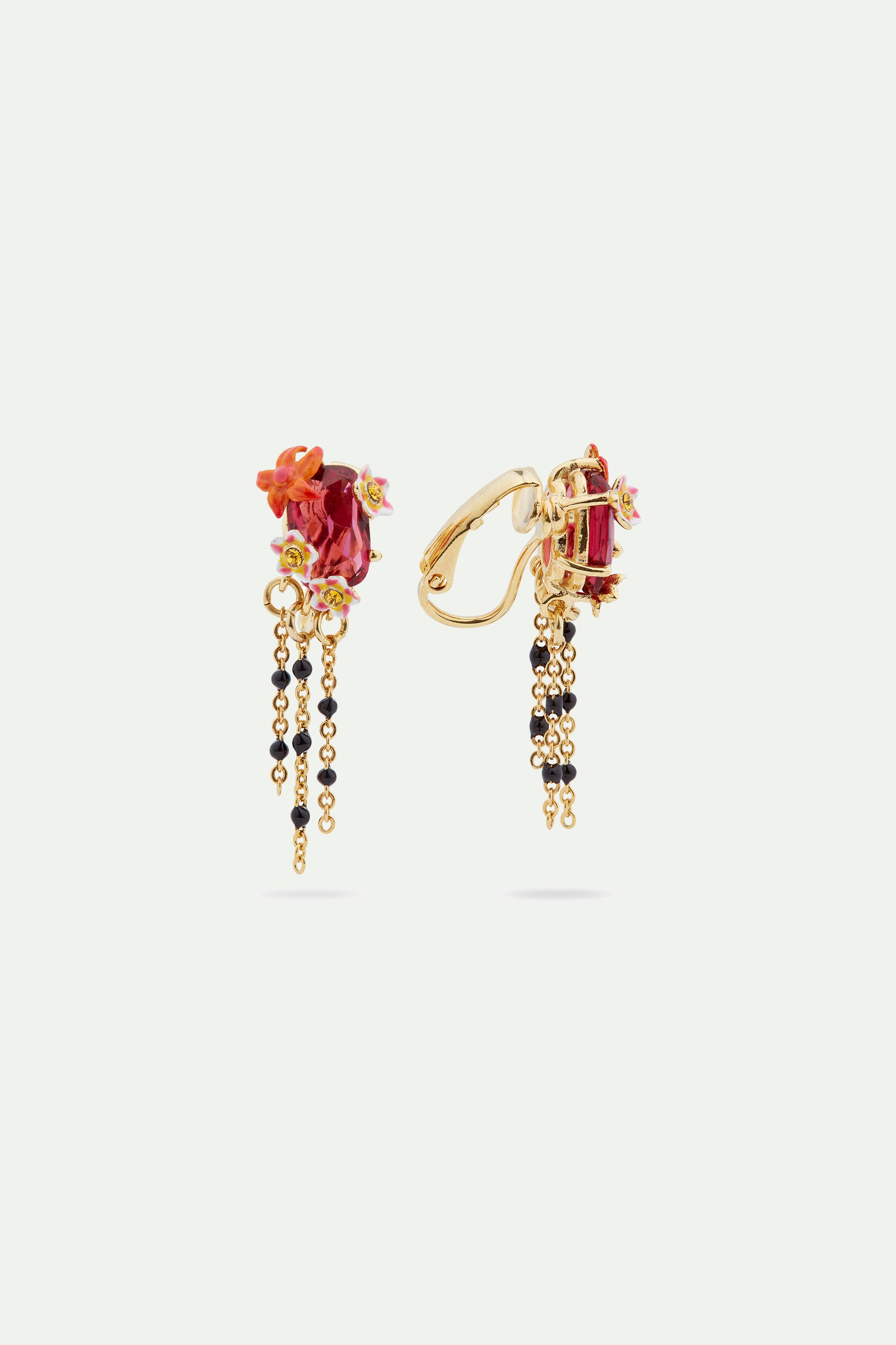 Faceted crystal and exotic flower dangling post earrings