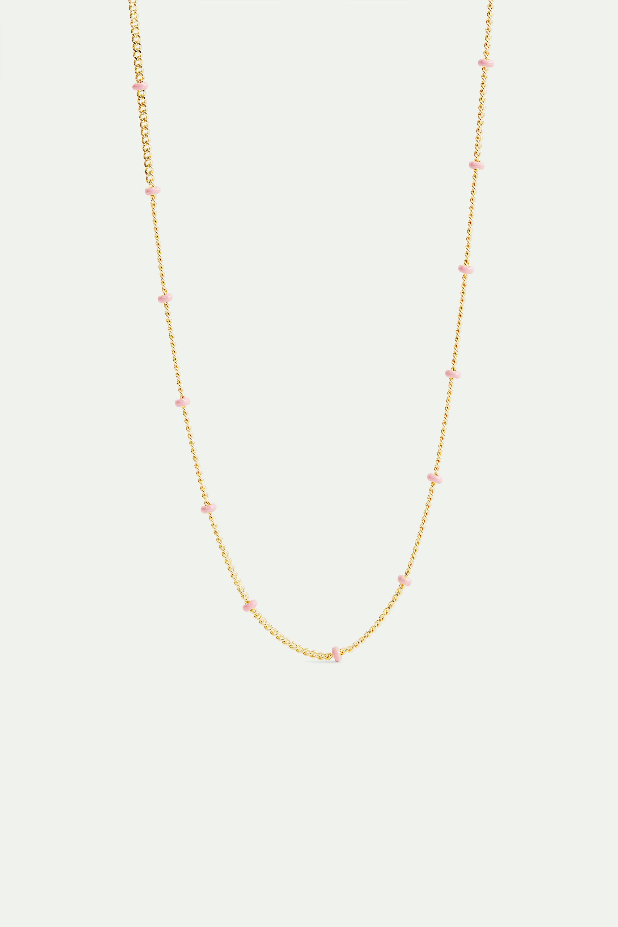 Enamelled golden chain and pink beads