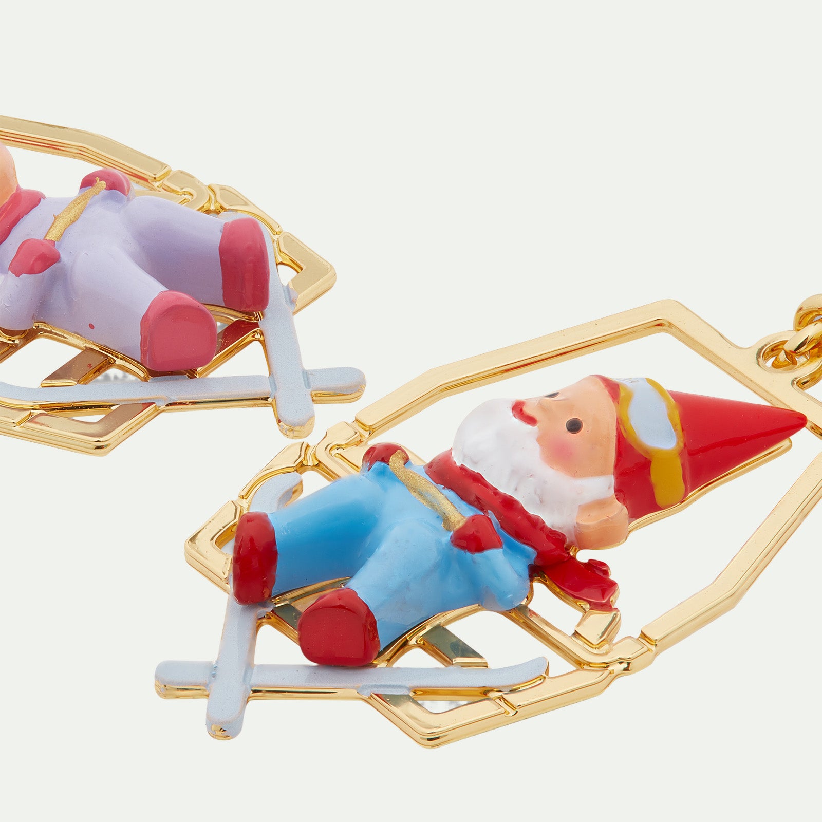 Garden gnomes sitting on chairlift clip-on earrings