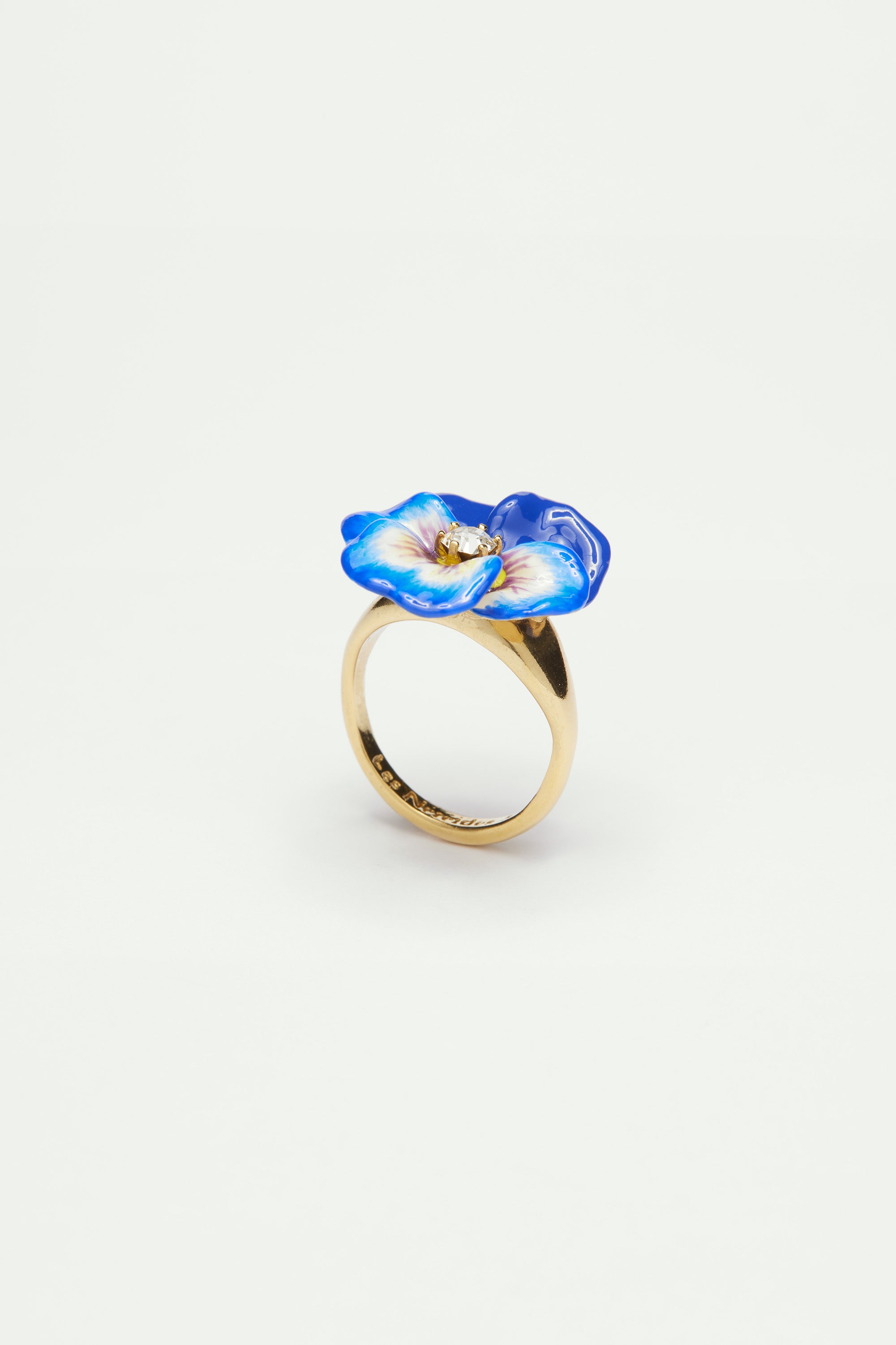 Blue pansy and faceted crystal cocktail ring