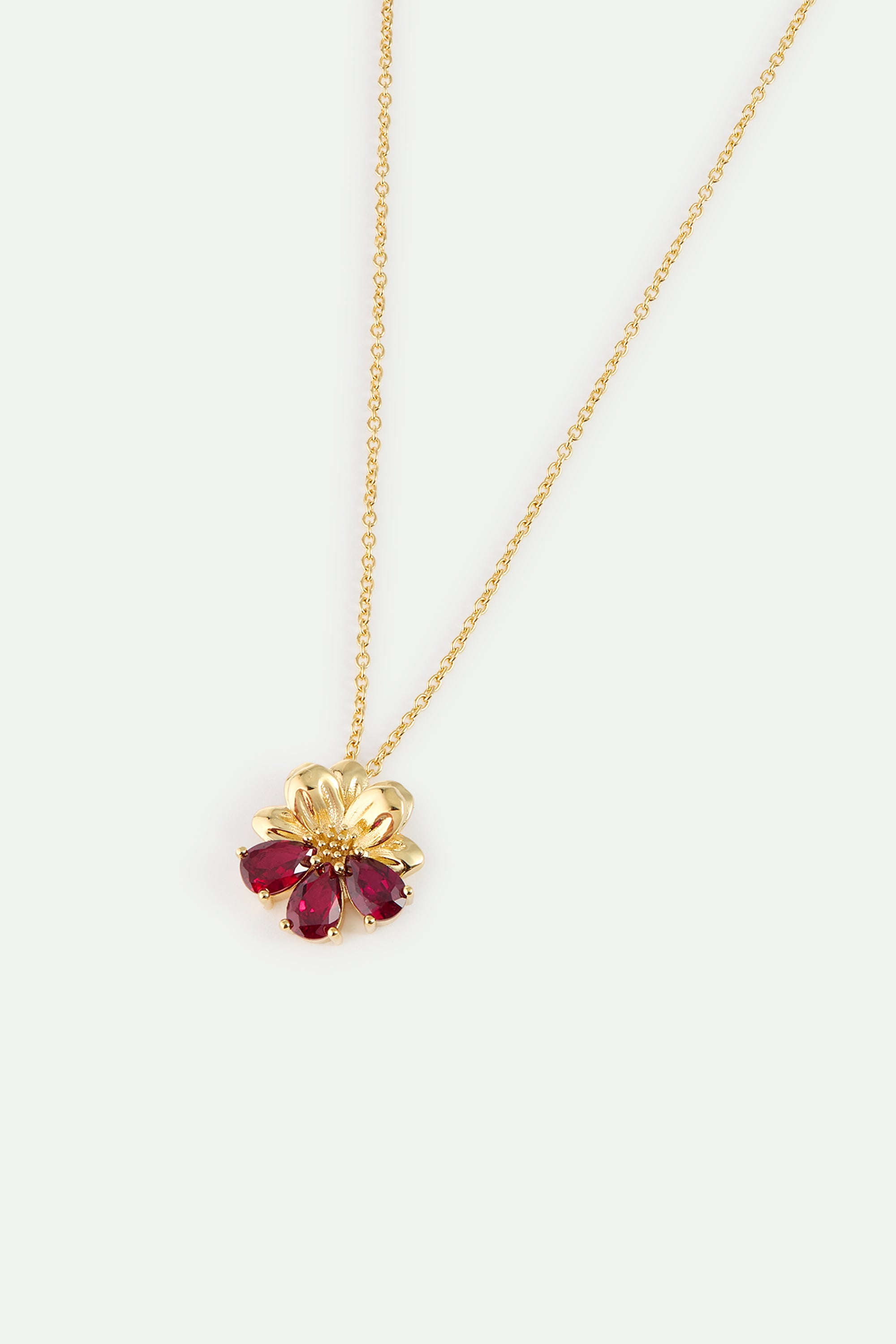 Collar con colgante cosmos y piedras rojas