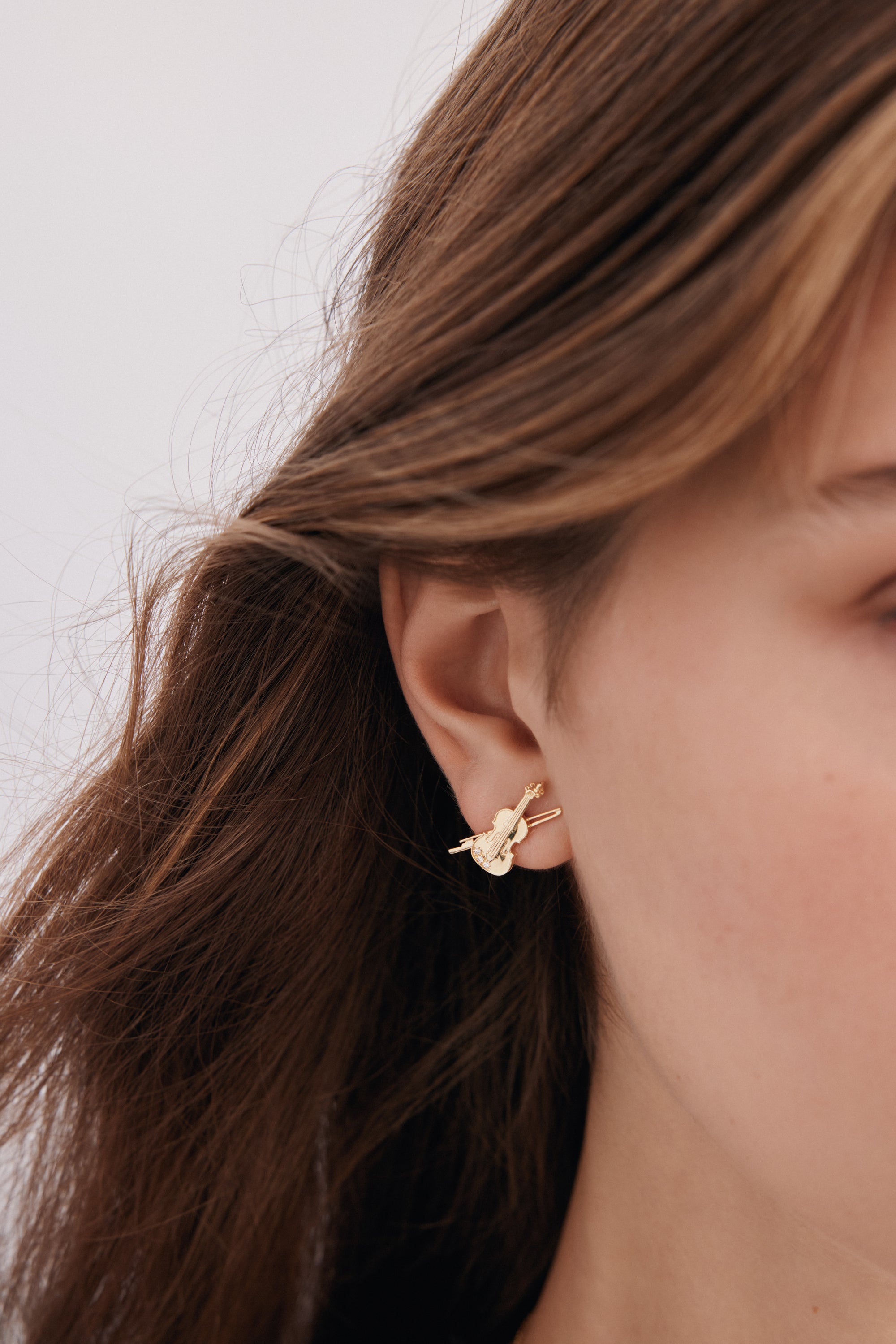 Gold cello earrings
