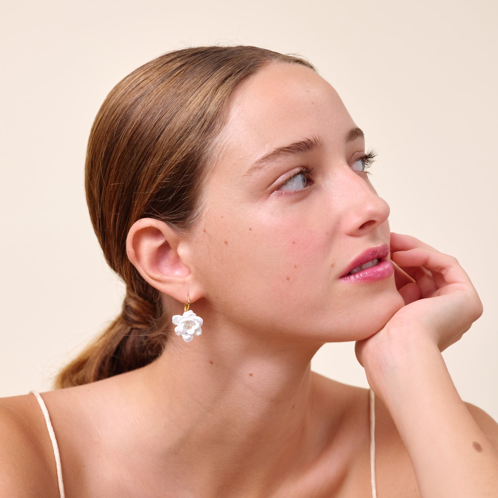 Gardenia and cut stone sleeper earrings