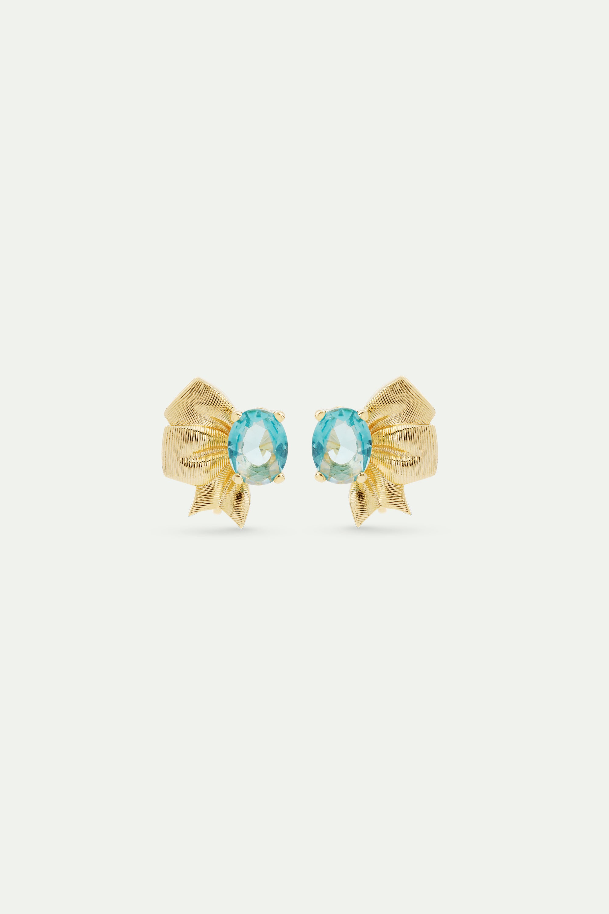 Gold ribbon and blue cut stone earrings